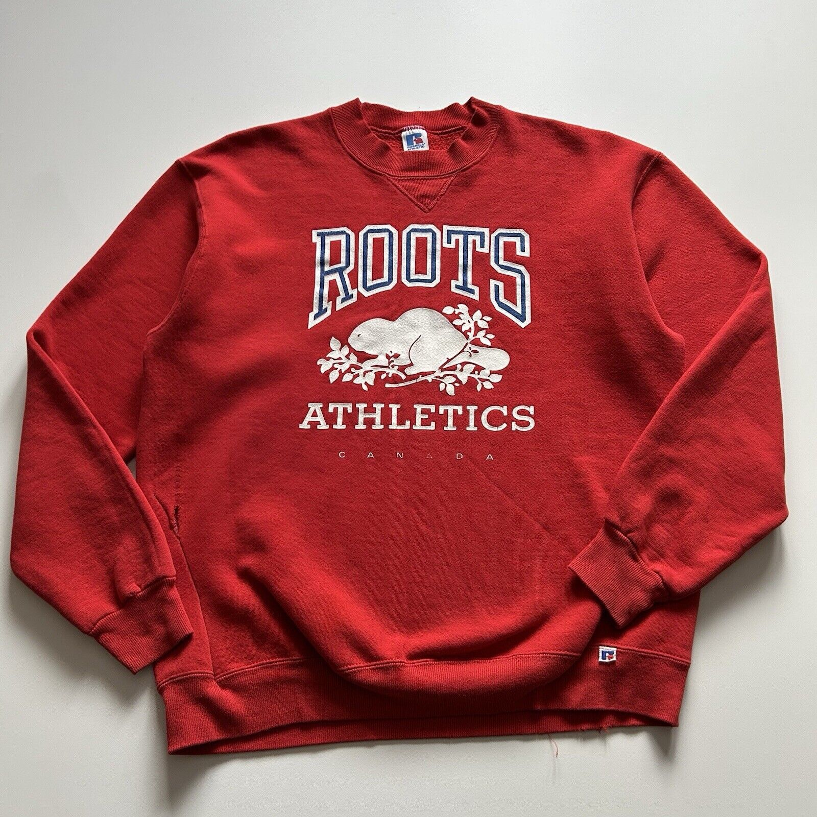 Vintage 1990s Roots Athletics Canada Graphic Crewneck Large T-Shirts, Hoodie, Sweatshirt | PodTeesHub.com