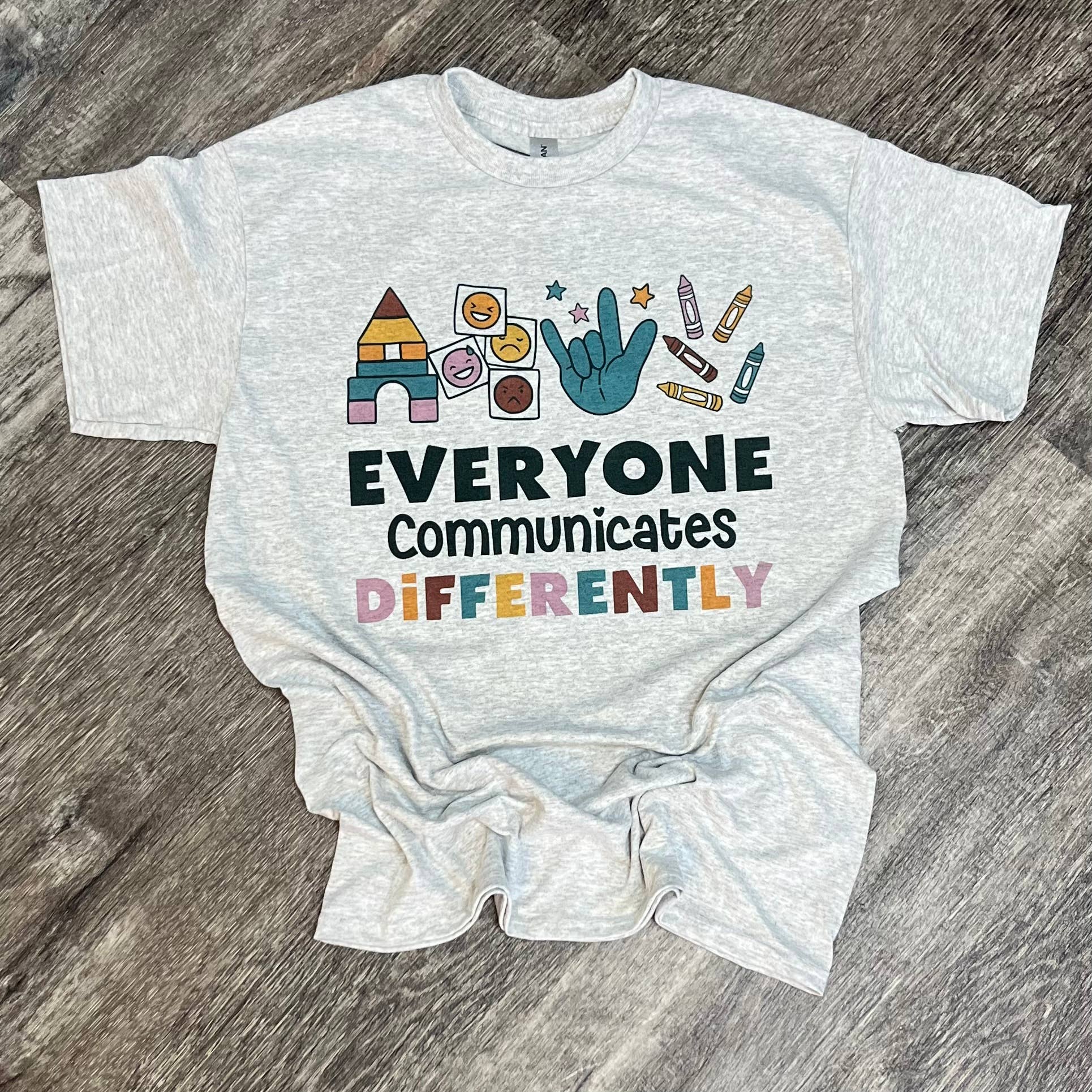 Autism Everyone Communicates Differently On Ash Gray Tee Hoodie, Sweatshirt | PodTeesHub.com