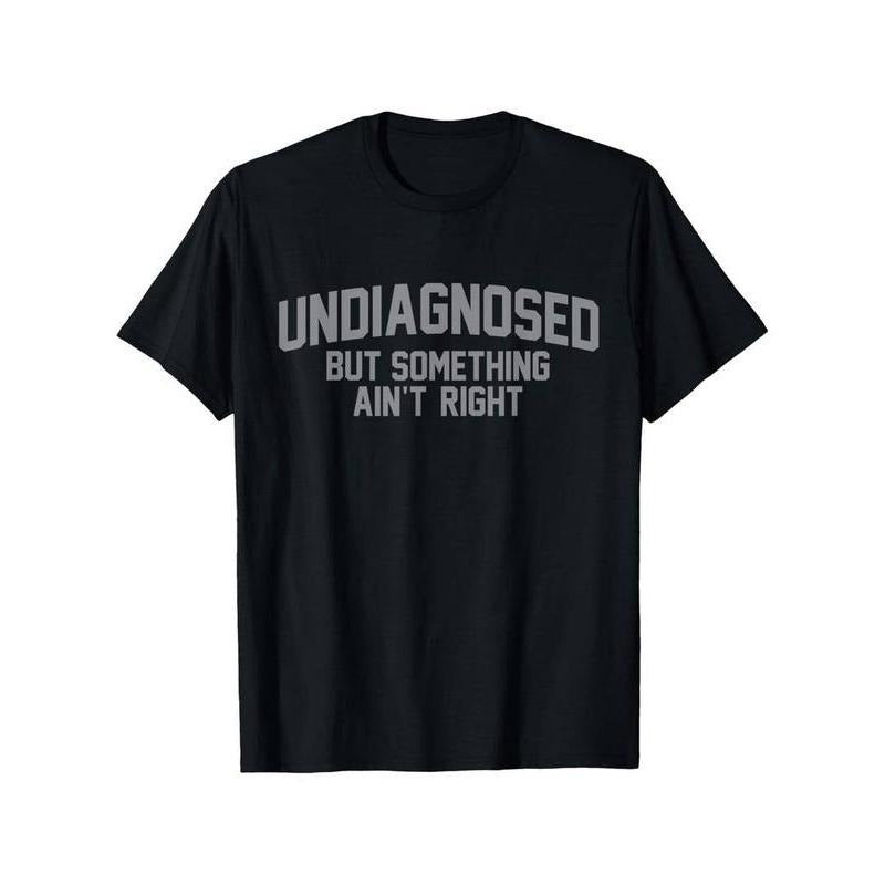 100% Cotton Short Sleeve Print Funny 'Undiagnosed But Something Ain'T Right' Humor T-Shirt Golf Gift T-Shirt For Men And...