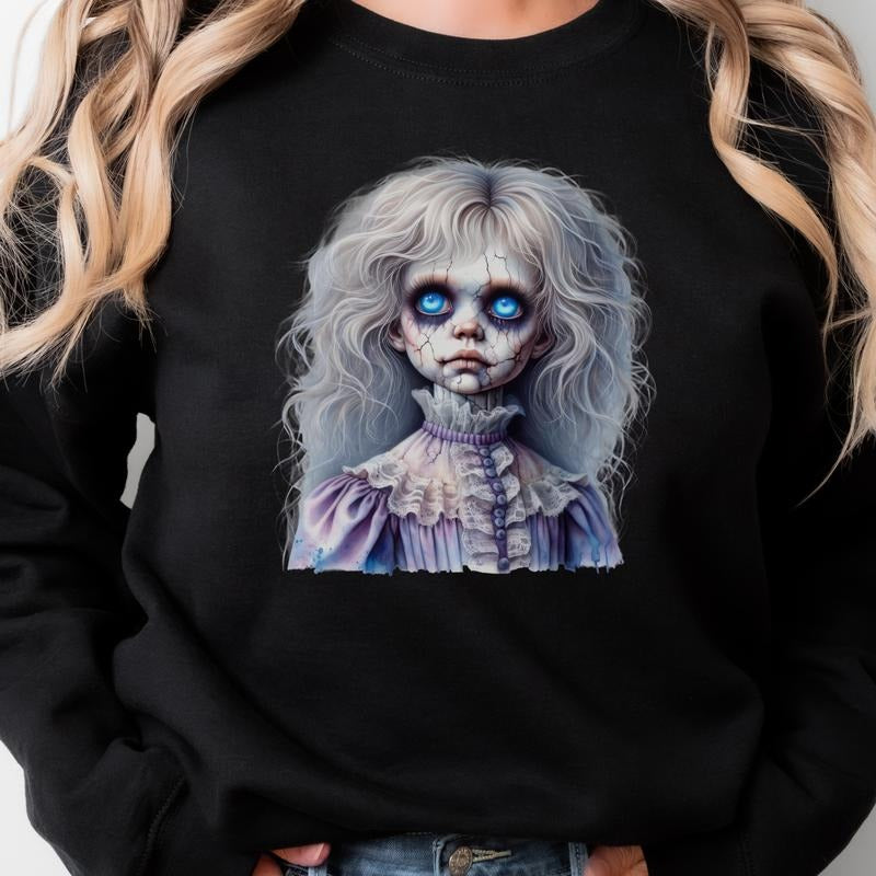 117T. CREEPY DOLL CHARACTER  WITH BRIGHT BLUE EYES Graphic Tees Casual T-Shirt Long Sleeve Crewneck Grunge Alt Aesthetic...
