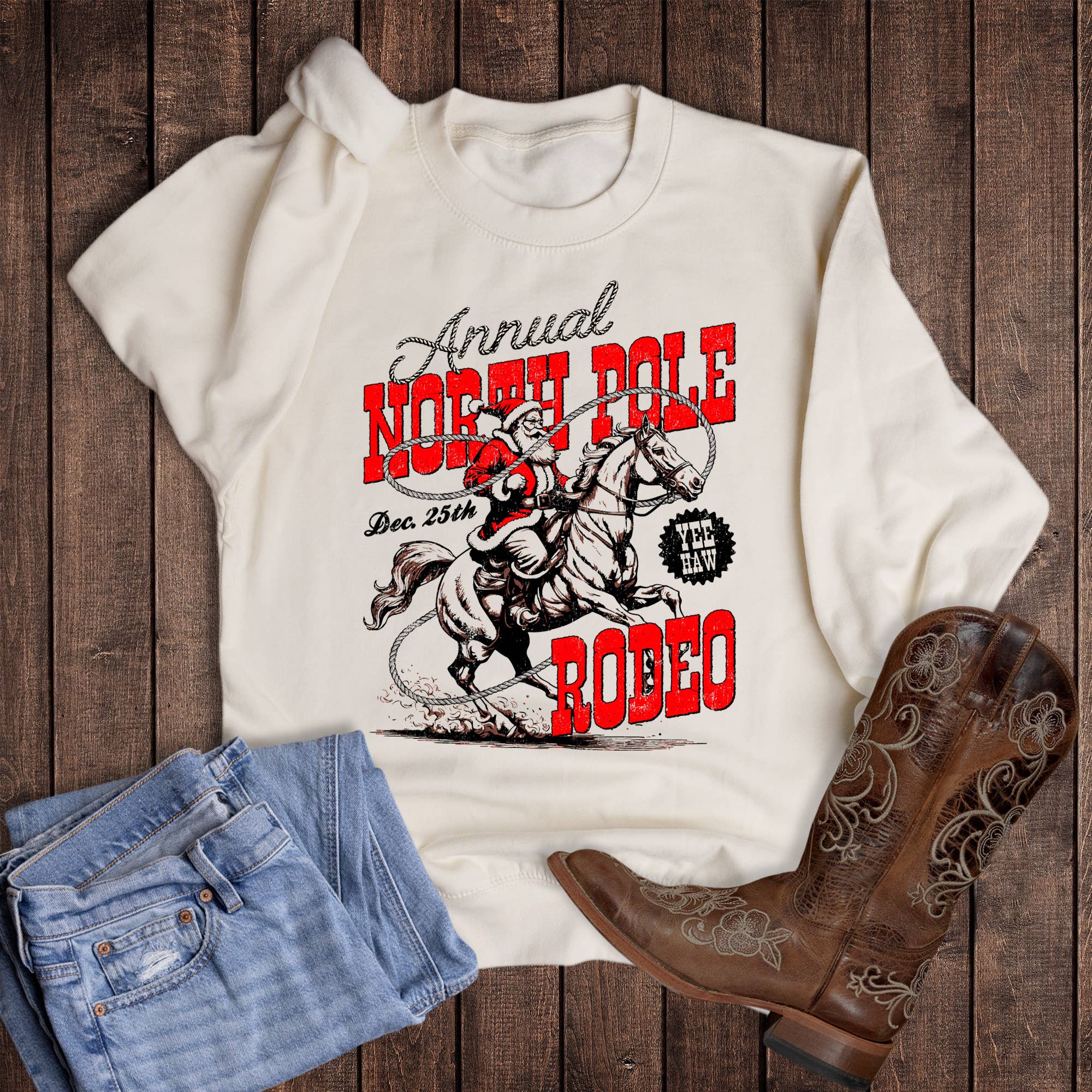 Christmas Western North Pole Rodeo Sweatshirt T-Shirts, Hoodie | PodTeesHub.com