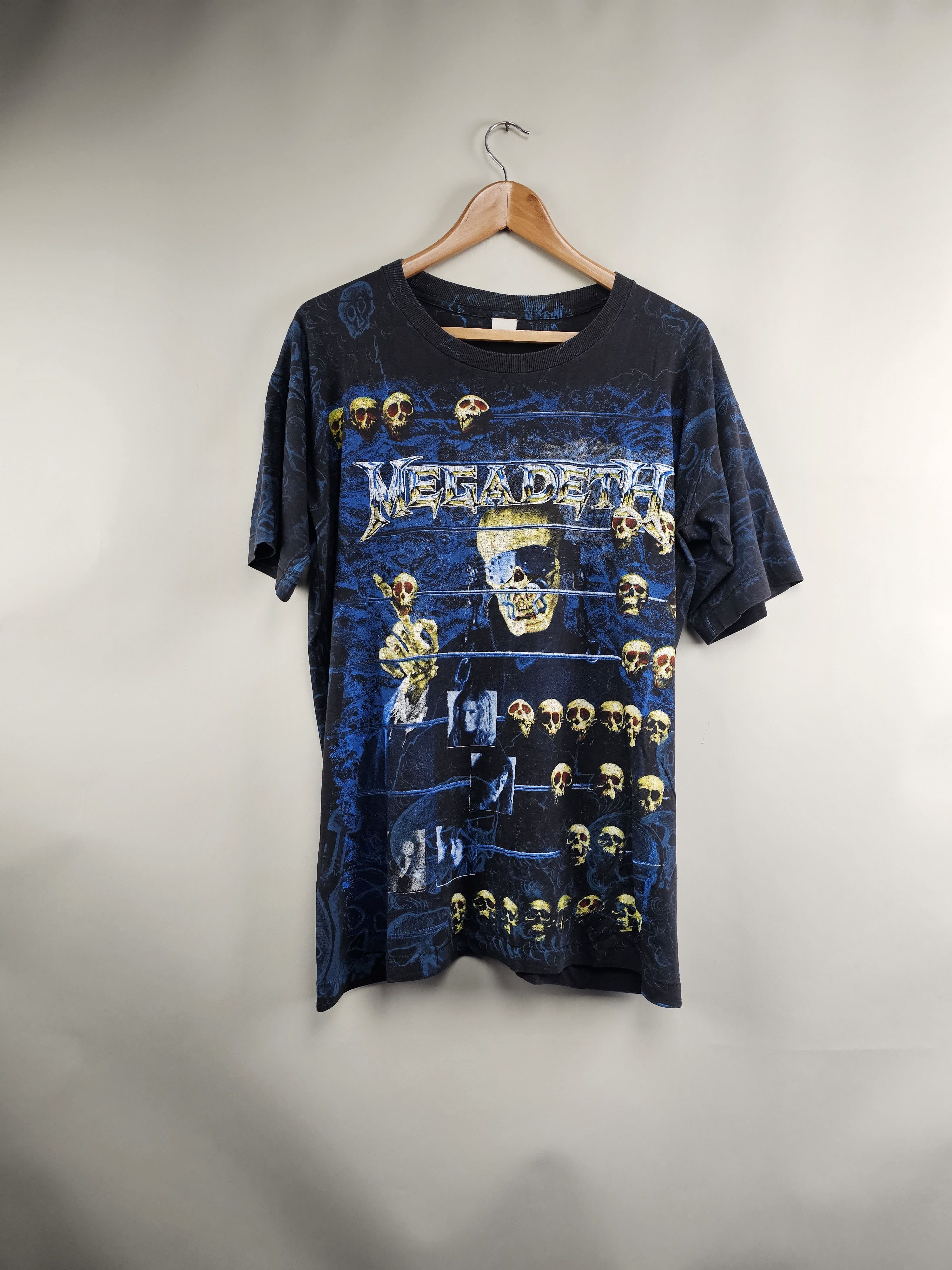 Megadeth X Vintage 90s Megadeth All Over Print Vic Rattlehead T-Shirts, Hoodie, Sweatshirt | PodTeesHub.com