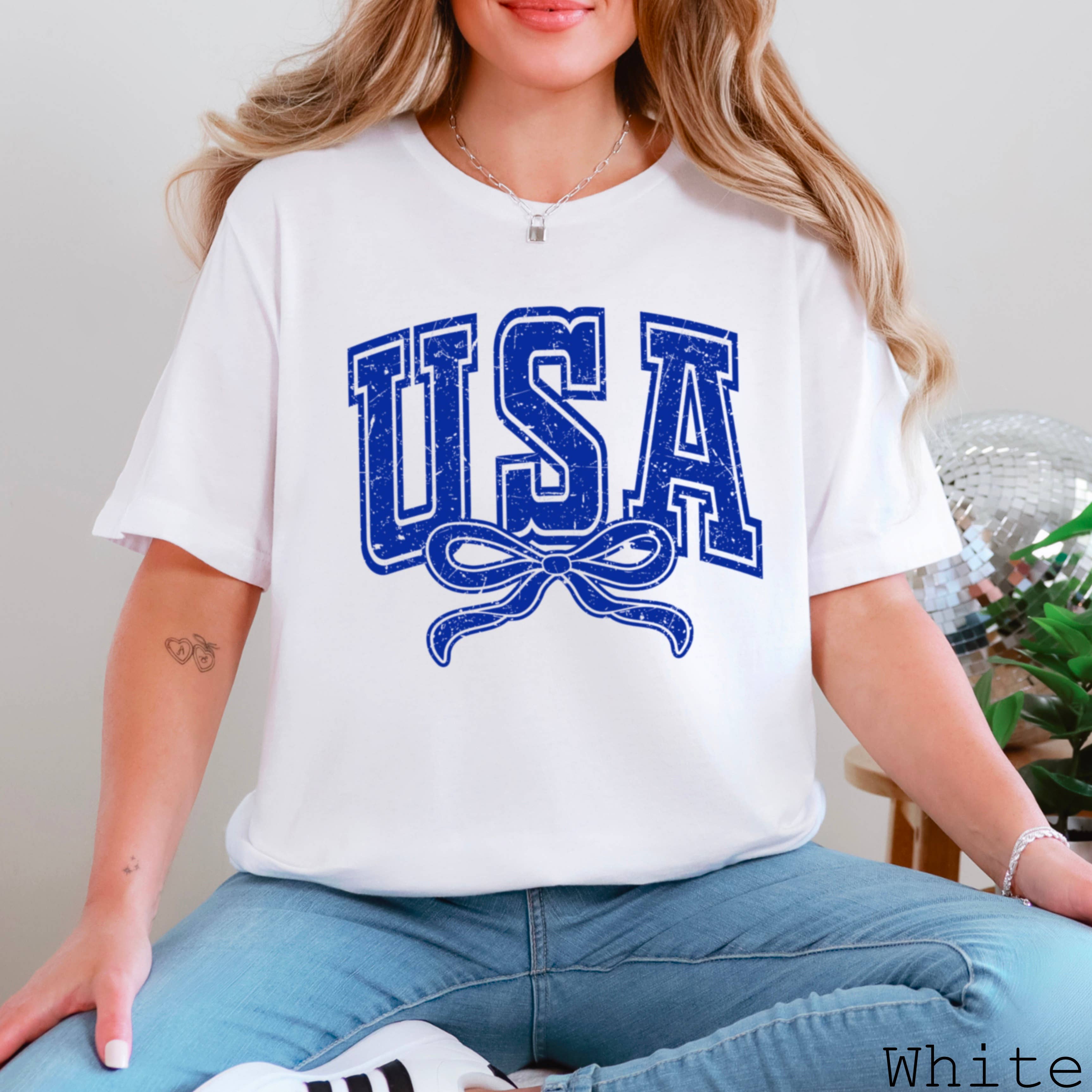 USA Coquette Bow July 4th Graphic Tee | Bella Canvas Hoodie, Sweatshirt | PodTeesHub.com