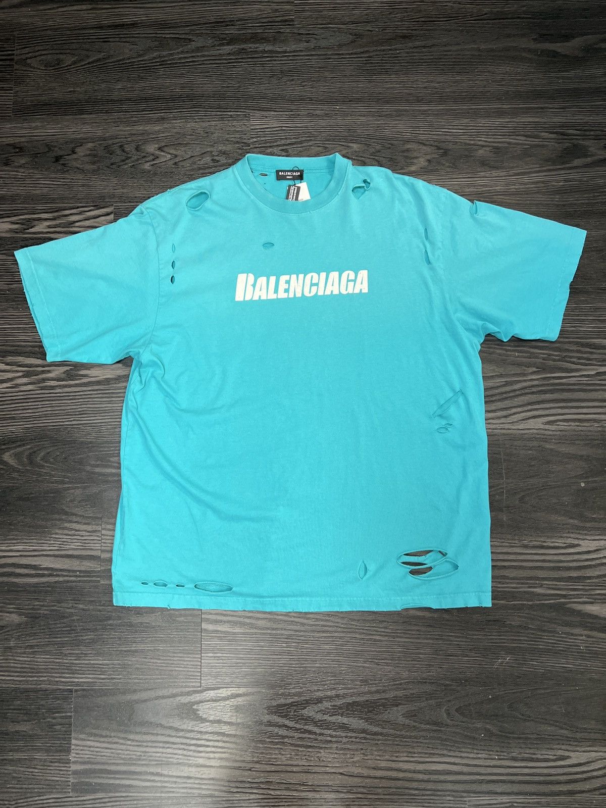 Balenciaga Caps Destroyed Flatground T Shirt Preowned Hoodie, Sweatshirt | PodTeesHub.com