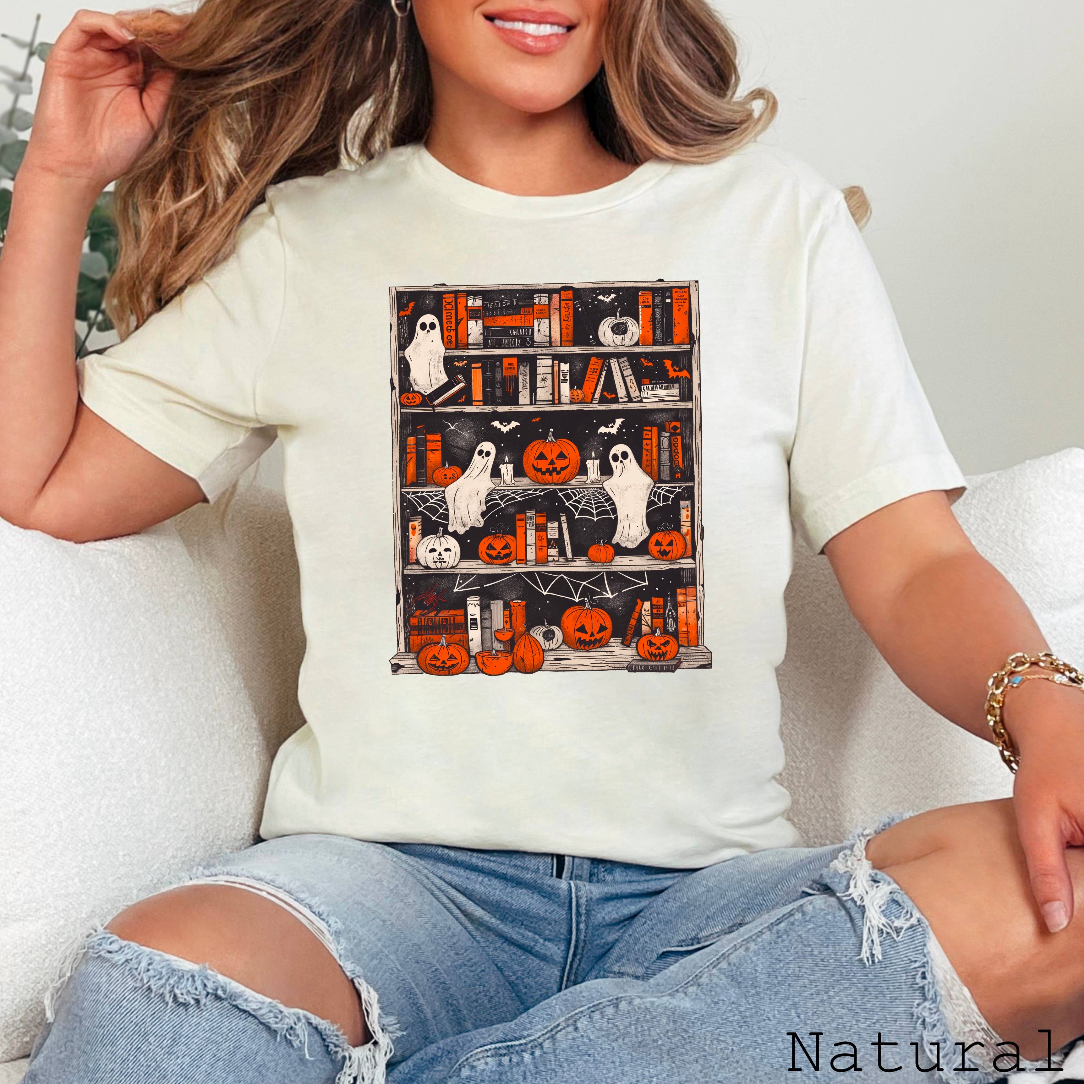 Halloween 2025 Ghost Bookcase Graphic Tee | Bella Canvas Hoodie, Sweatshirt | PodTeesHub.com