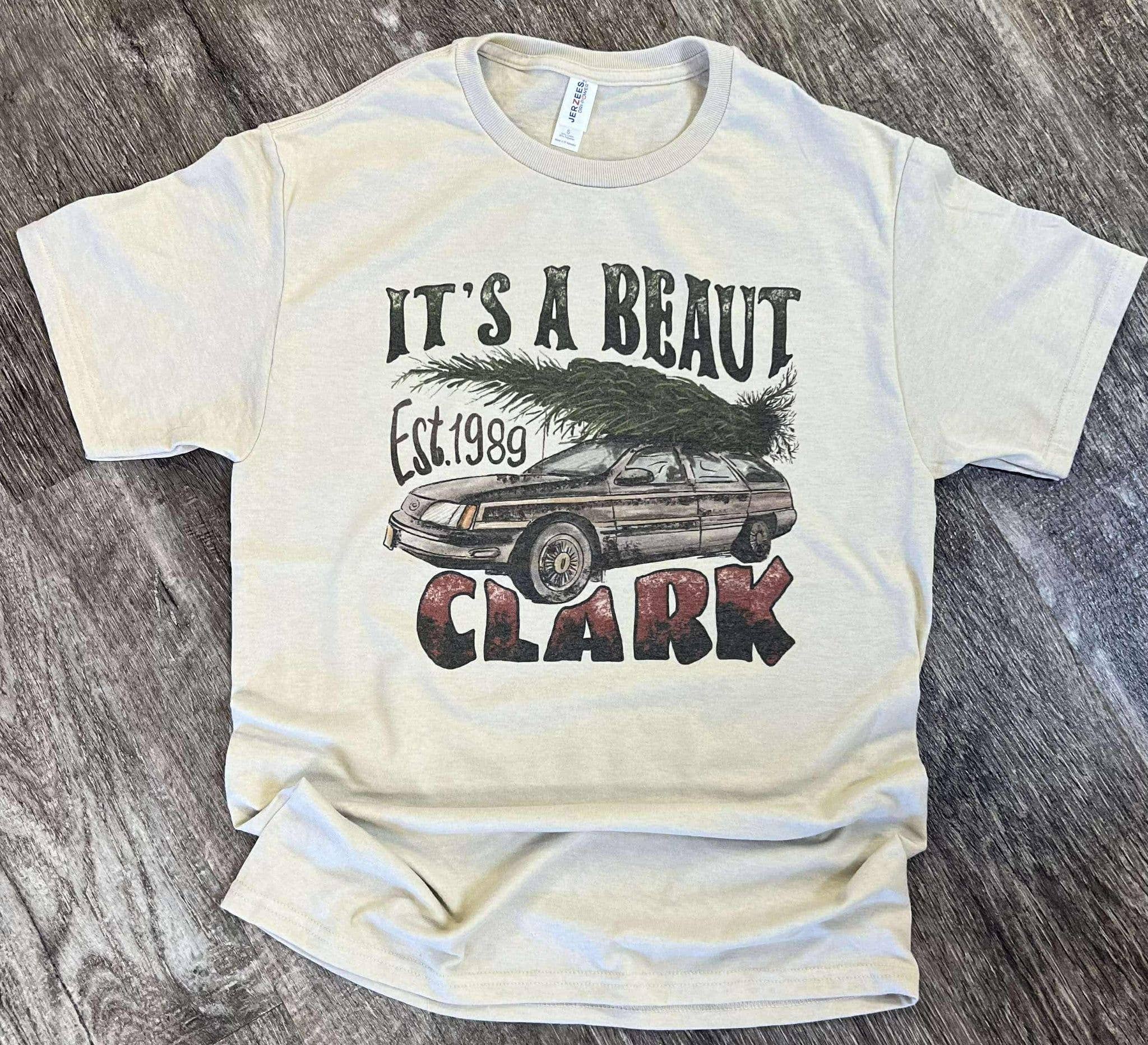 It's A Beaut Clark Christmas Tree On Car On Sand Tee Hoodie, Sweatshirt | PodTeesHub.com