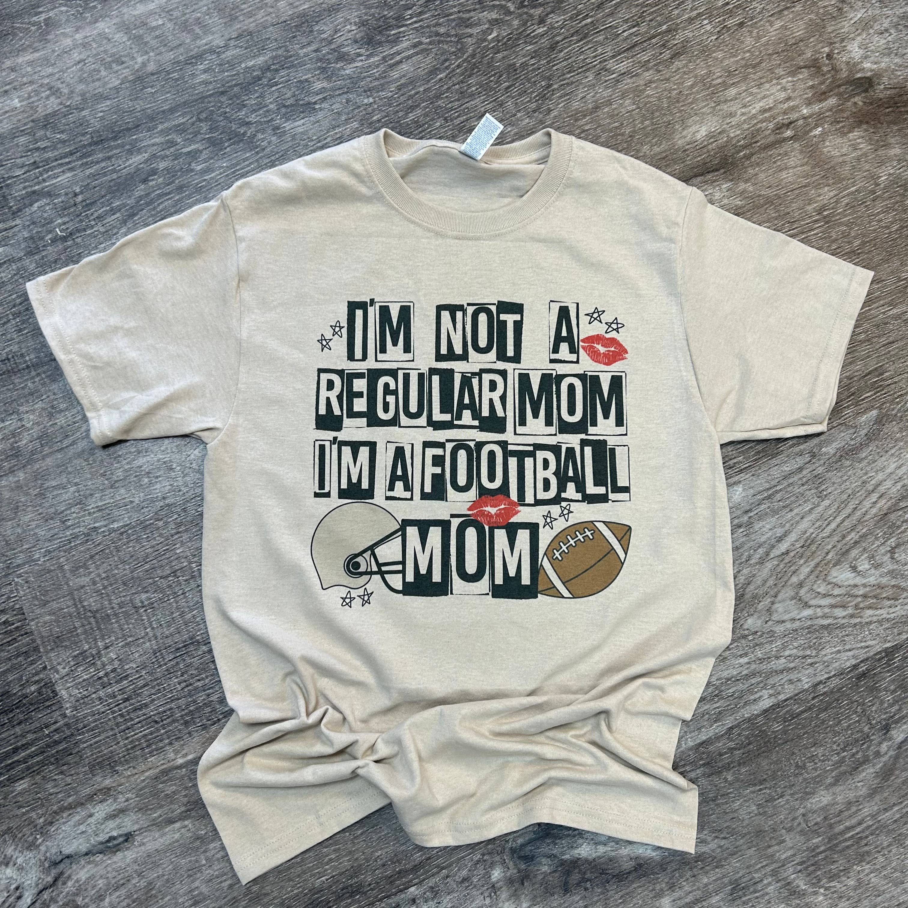 I’M Not A Regular Mom I’M A Football Mom On Sand Tee Hoodie, Sweatshirt | PodTeesHub.com