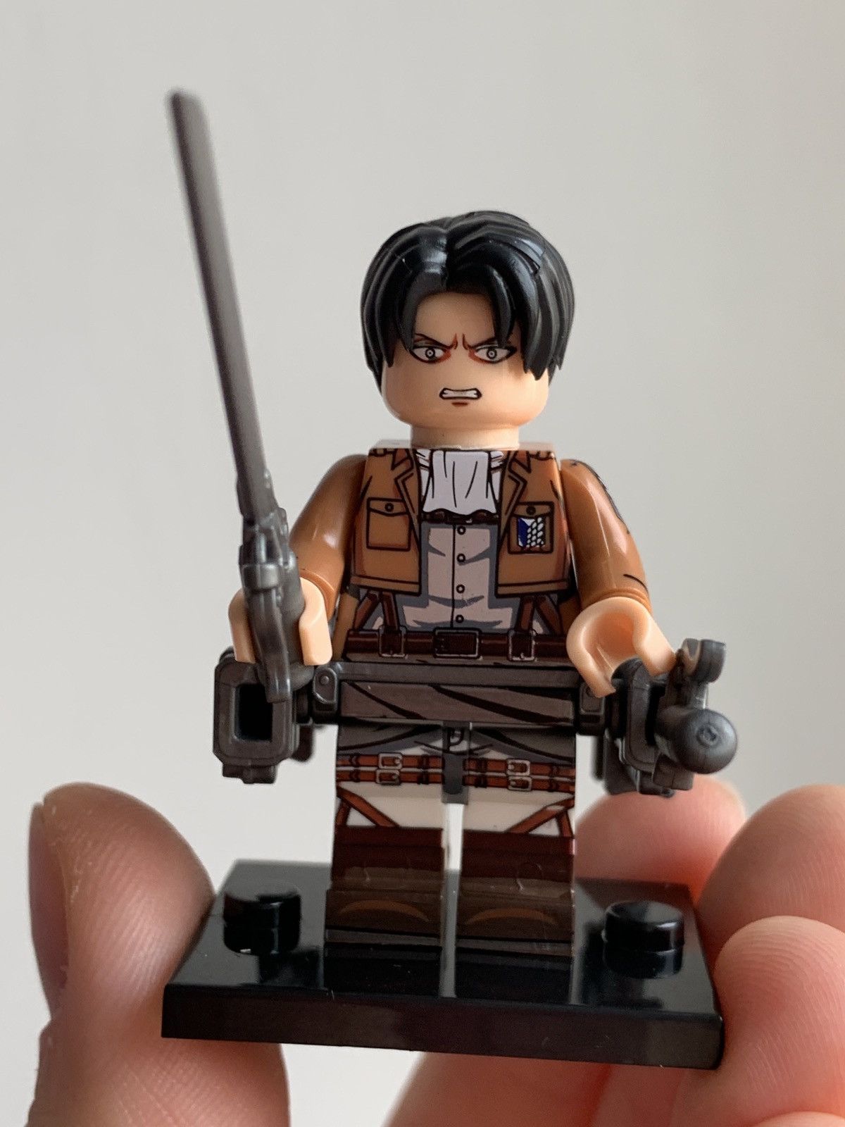 Designer X Japanese Brand Attack On Titan Anime Figure Minifigure Levi T-Shirts, Hoodie, Sweatshirt | PodTeesHub.com