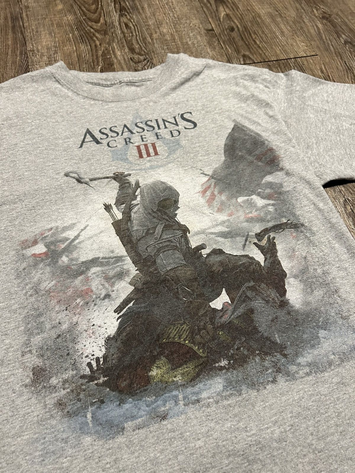 Vintage Y2k Xbox Assassins Creed 3 Game Promo Graphic Tee Shirt Hoodie, Sweatshirt | PodTeesHub.com