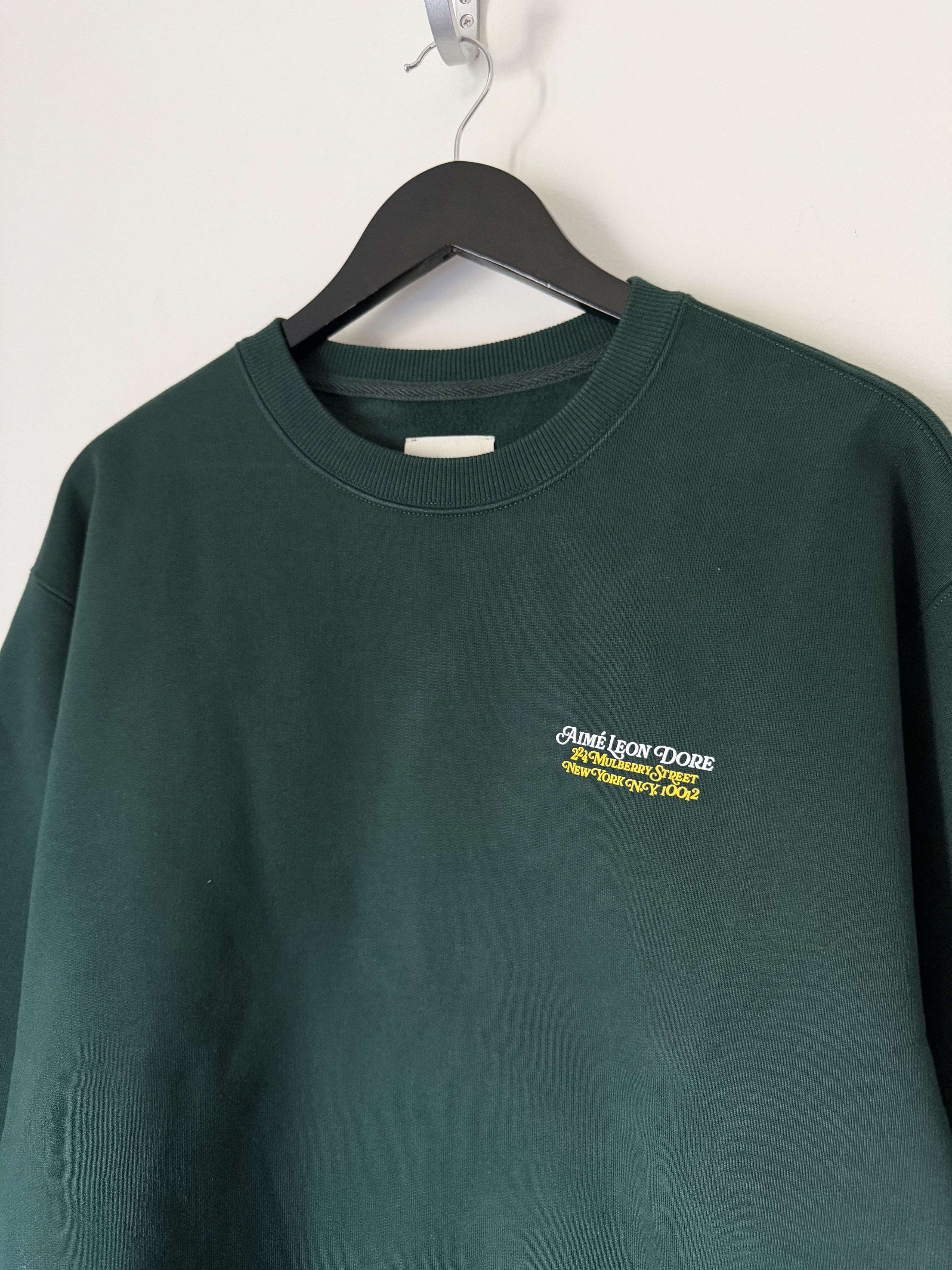 Leon Dore Aime Leon Dore Monogram Crewneck Sweatshirt In Green T-Shirts, Hoodie | PodTeesHub.com