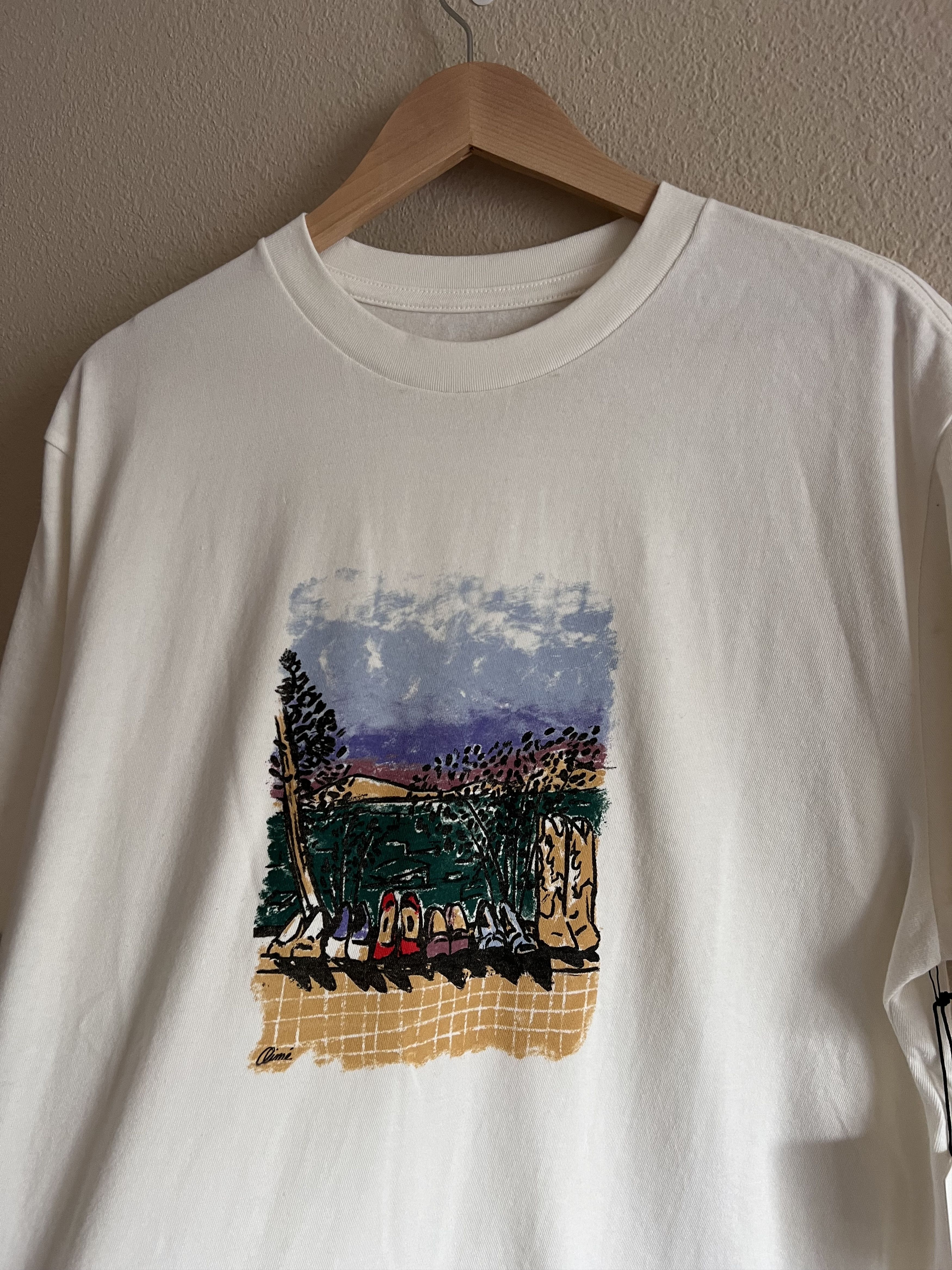 Leon Dore Aime Leon Dore Molina Shoes Graphic Tee In Milk Hoodie, Sweatshirt | PodTeesHub.com