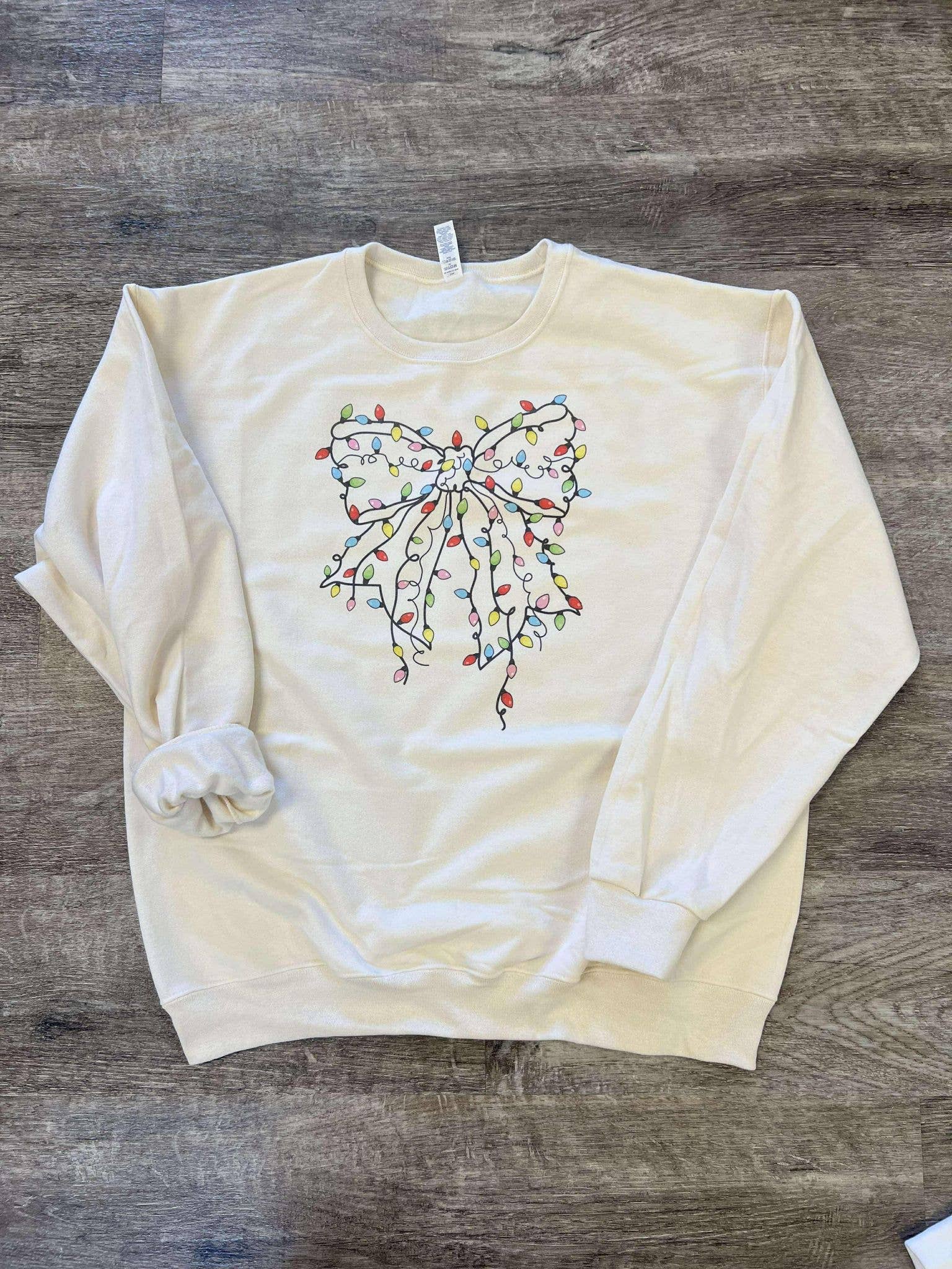 Christmas Tree Lights Bow On Cream Sweatshirt T-Shirts, Hoodie | PodTeesHub.com