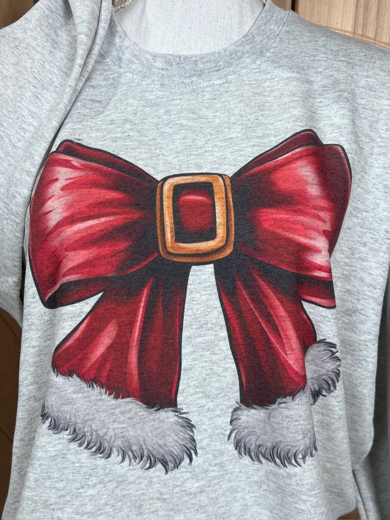 Santa Bow Sweatshirt On Ash Gray T-Shirts, Hoodie | PodTeesHub.com