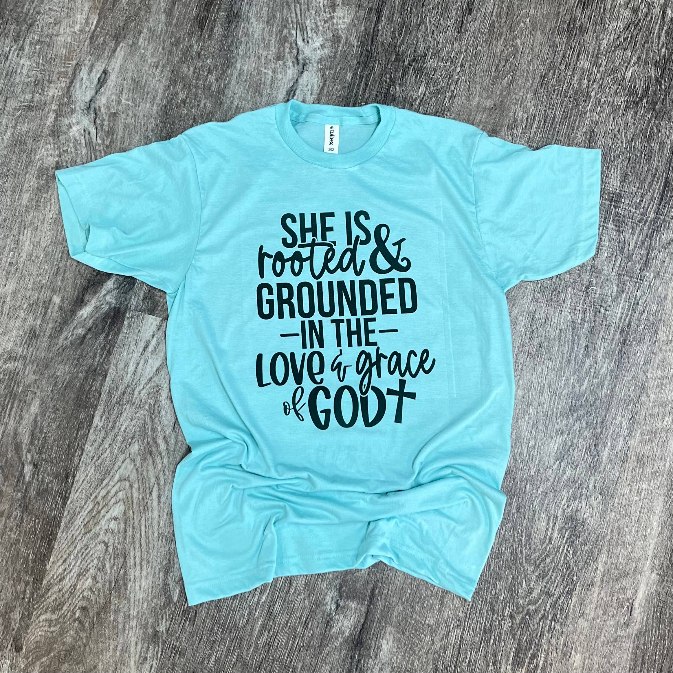 She Is Rooted & Grounded in Love On Purist Blue Tee Hoodie, Sweatshirt | PodTeesHub.com