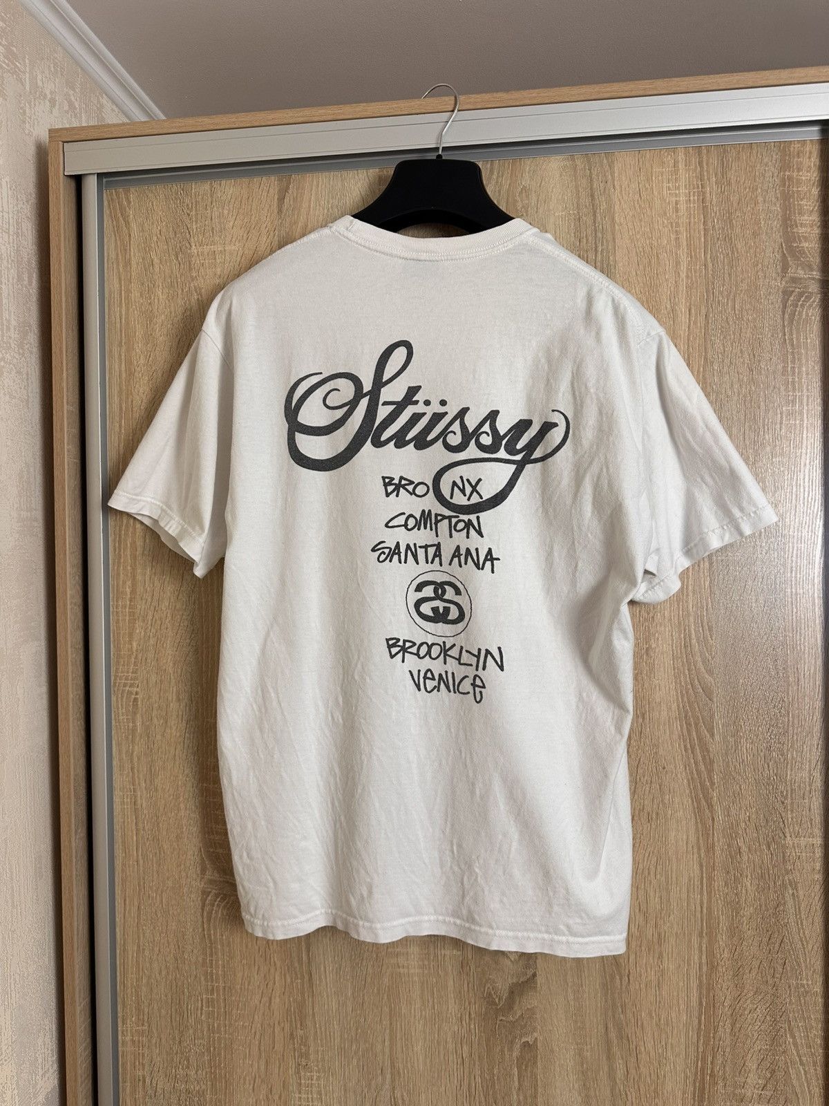 Stussy World Tour Graphic Tee Shirt White Big Logo Vintage Hoodie, Sweatshirt | PodTeesHub.com