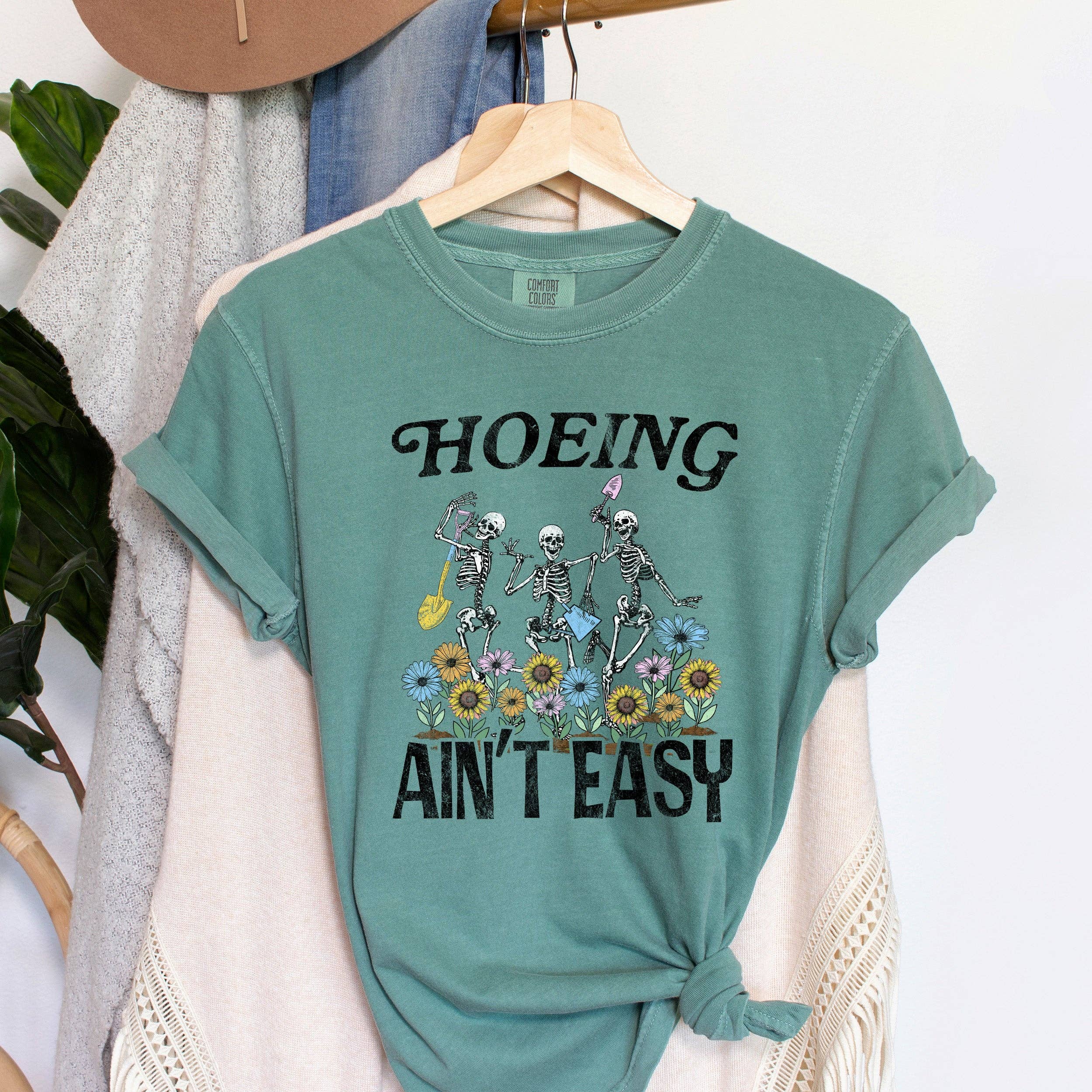 Hoeing Ain't Easy Funny T-Shirt Hoodie, Sweatshirt | PodTeesHub.com
