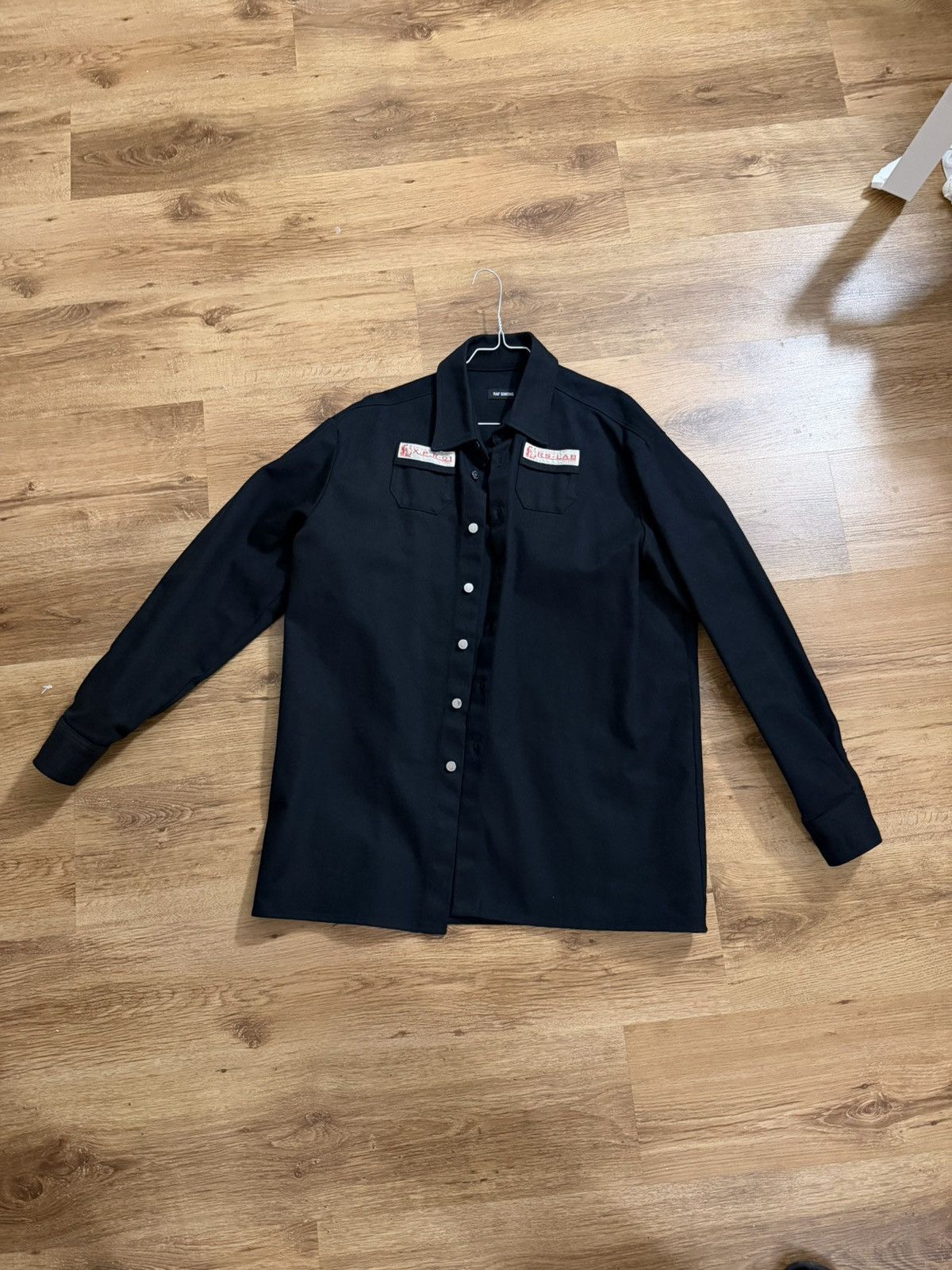 Simons Raf Simons Logo Patch Shirt Hoodie, Sweatshirt | PodTeesHub.com