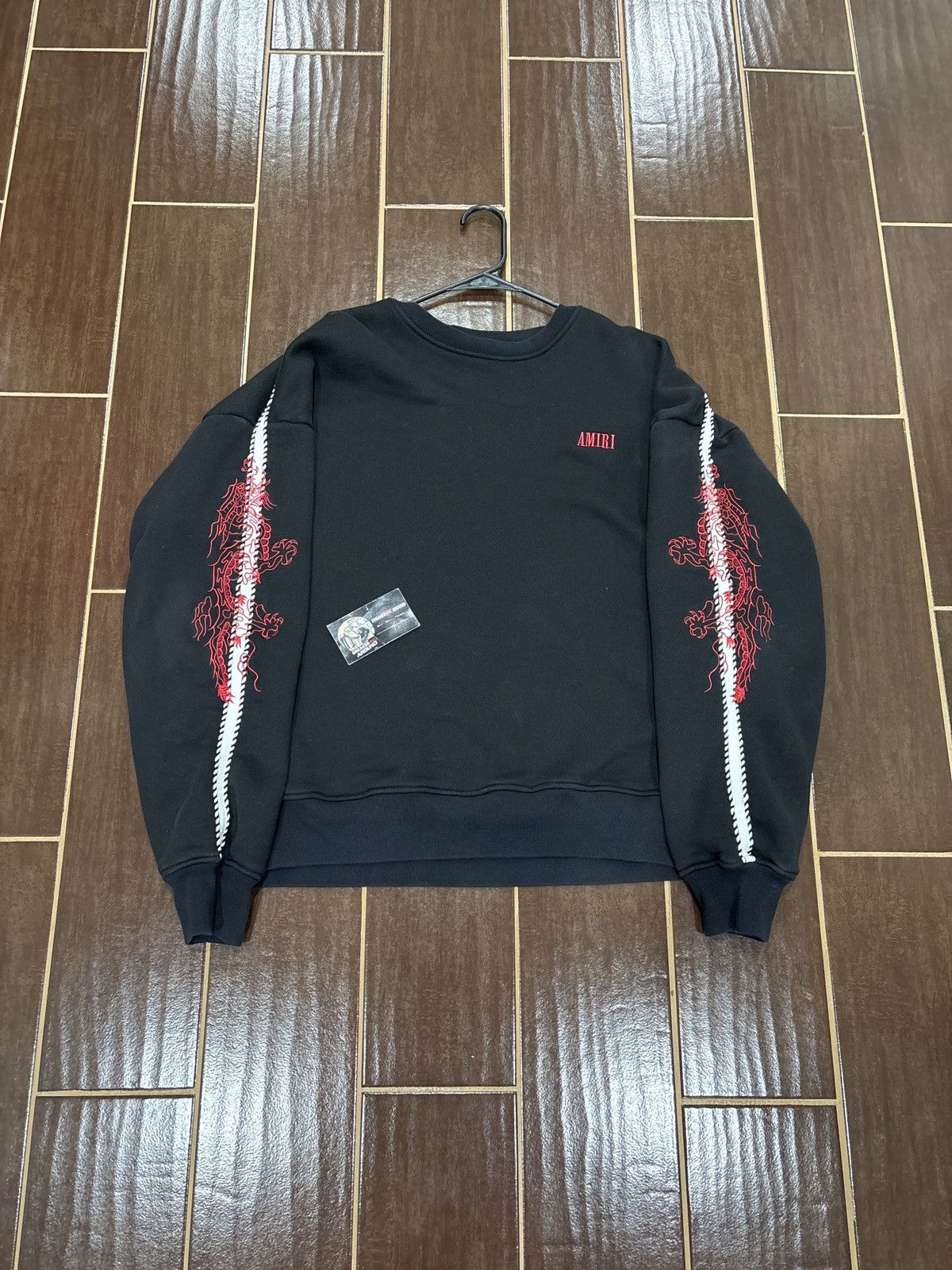 Light Wear Amiri Dragon Outline Crewneck Black Sz S Fits Big T-Shirts, Hoodie, Sweatshirt | PodTeesHub.com