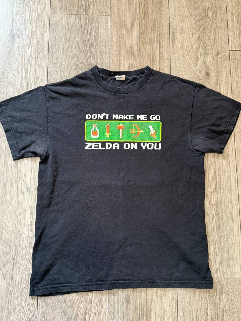 Delta 2000s Vintage Y2k T Shirt Zelda Graphic Print Size M Black Hoodie, Sweatshirt | PodTeesHub.com