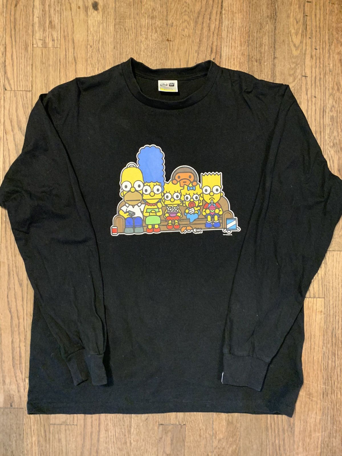 The Simpsons Bape X The Simpsons Baby Milo Couch Long Sleeve Tee Hoodie, Sweatshirt | PodTeesHub.com