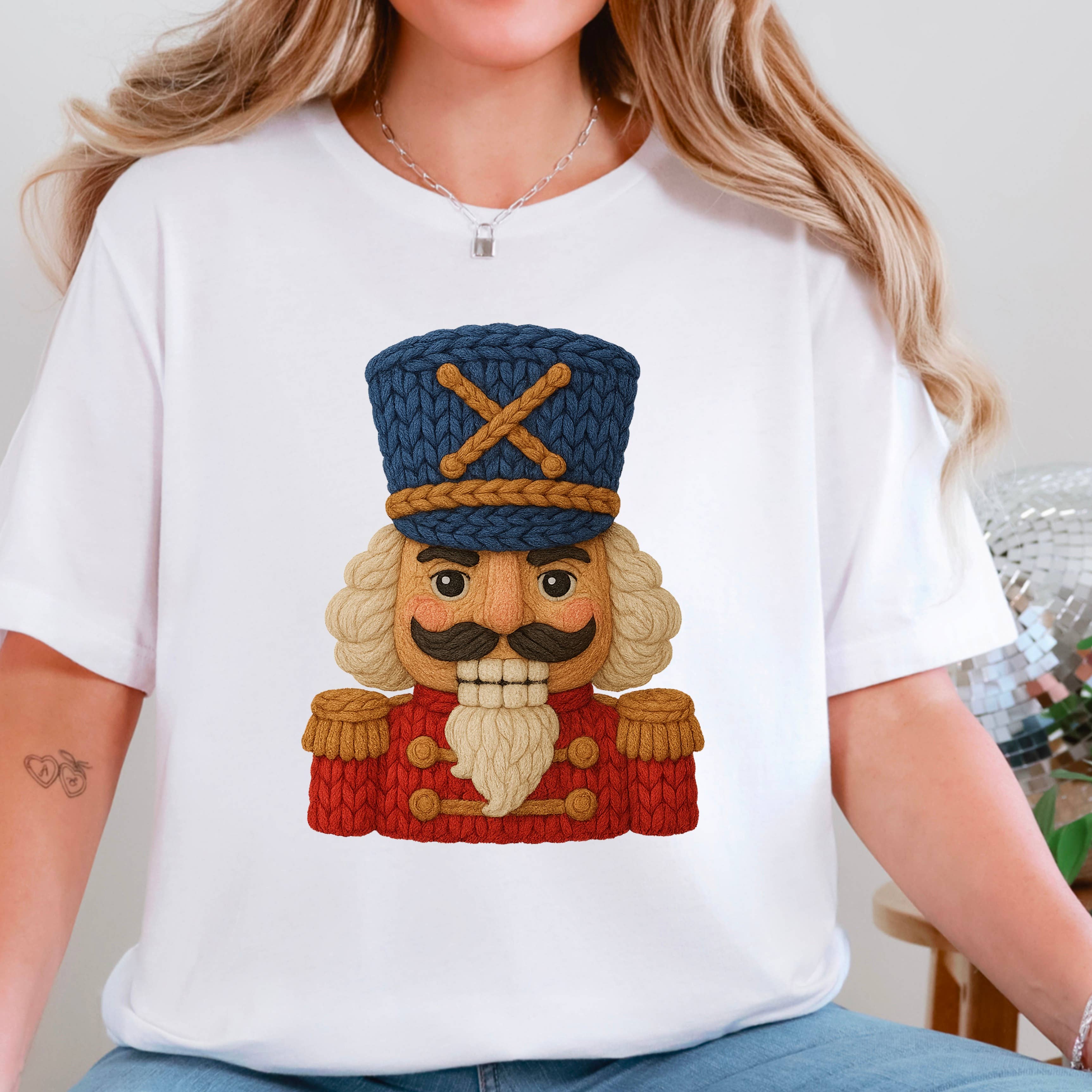 Faux Yarn Nutcrack Christmas 2025 Graphic Tee | Bella Canvas Hoodie, Sweatshirt | PodTeesHub.com