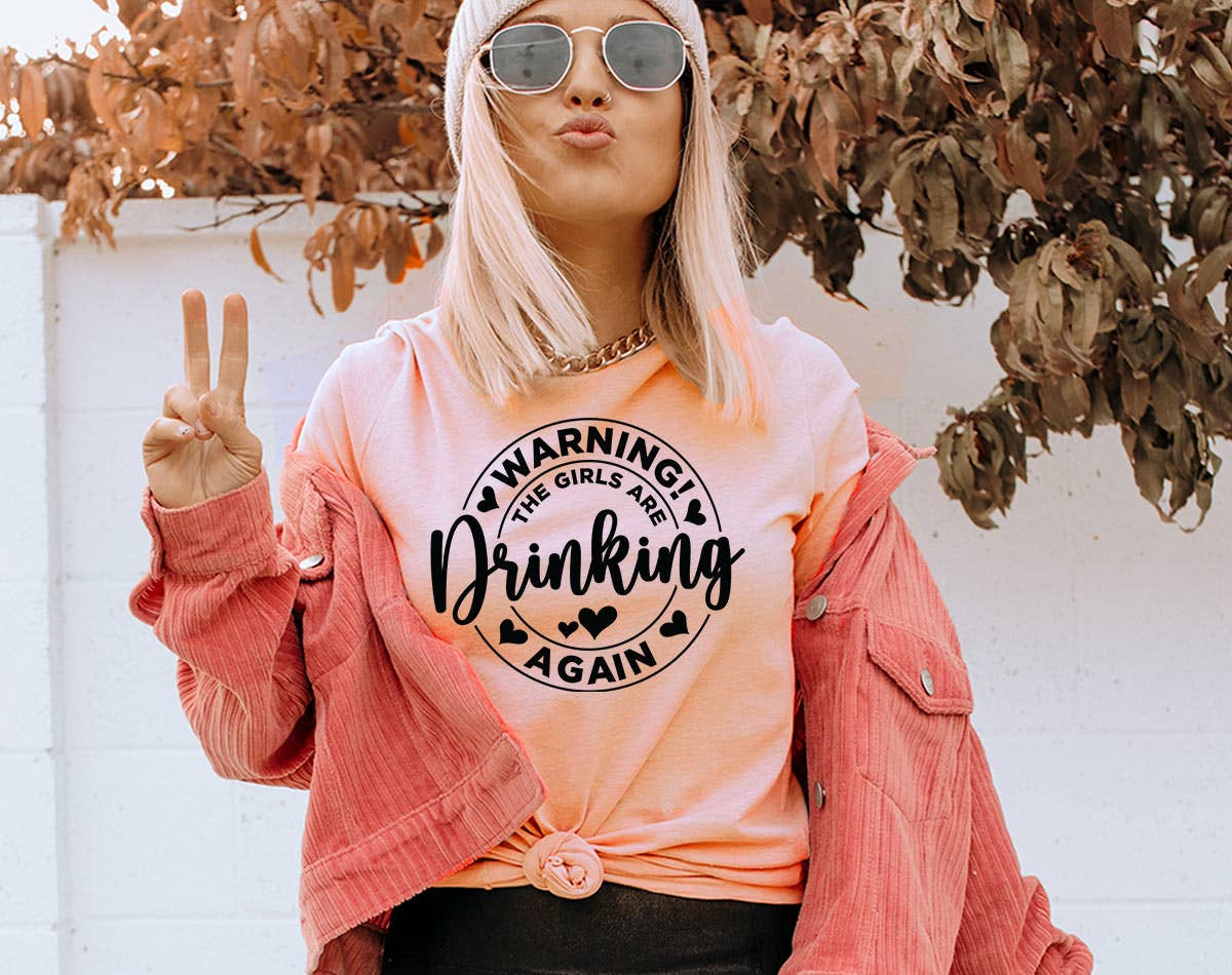 Warning the Girls Are Drinking - Funny Girls Trip T-Shirt Hoodie, Sweatshirt | PodTeesHub.com