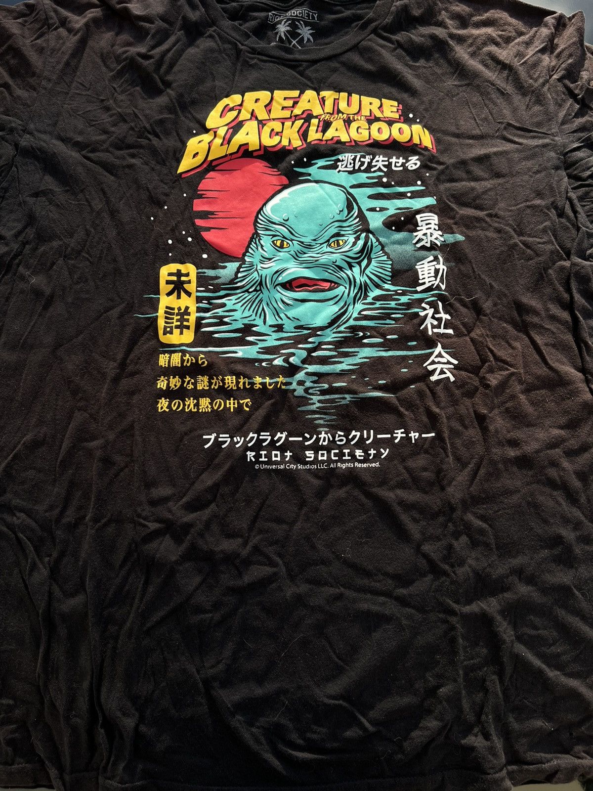 Universal Studios Riot Society X Universal Creature Black Lagoon Horror Tee Hoodie, Sweatshirt | PodTeesHub.com