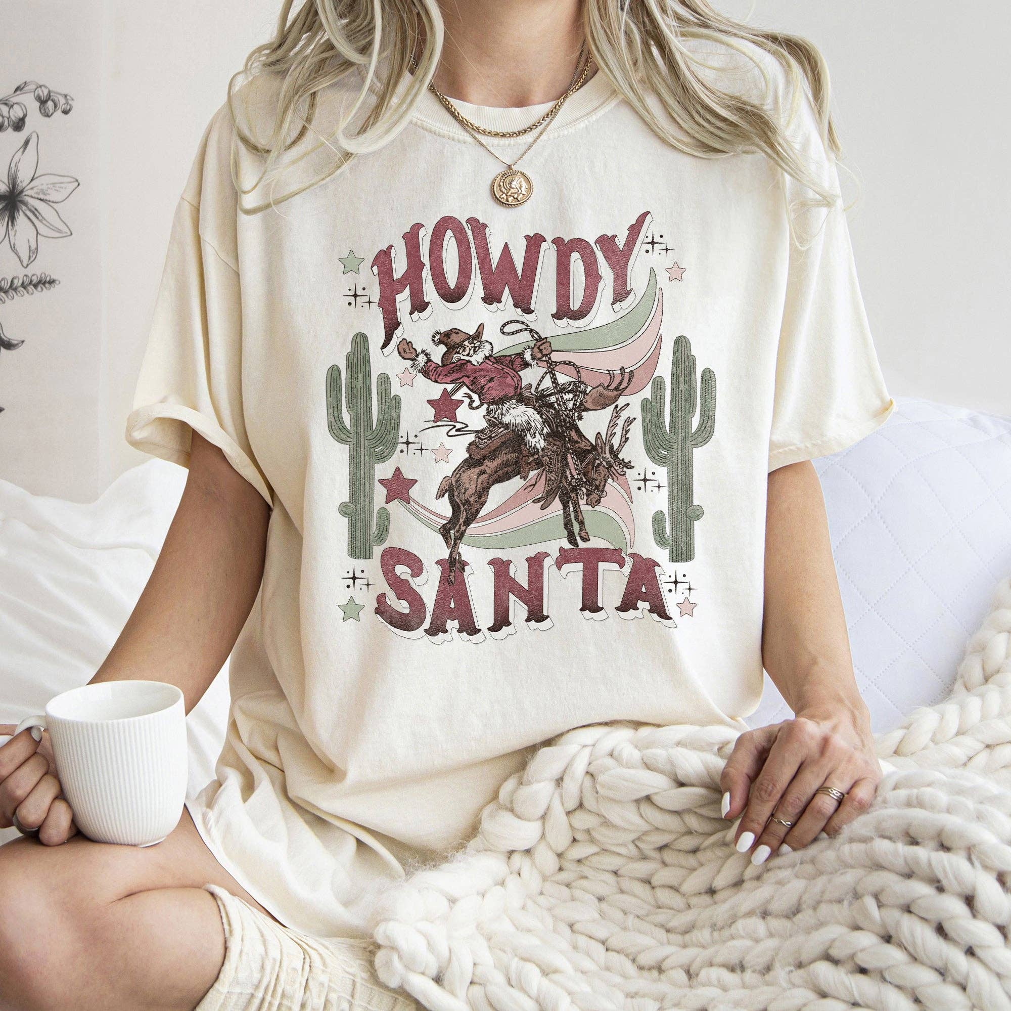 Howdy Santa, Santa Cowboy, Reindeer, Rodeo, Desert T-Shirt Hoodie, Sweatshirt | PodTeesHub.com