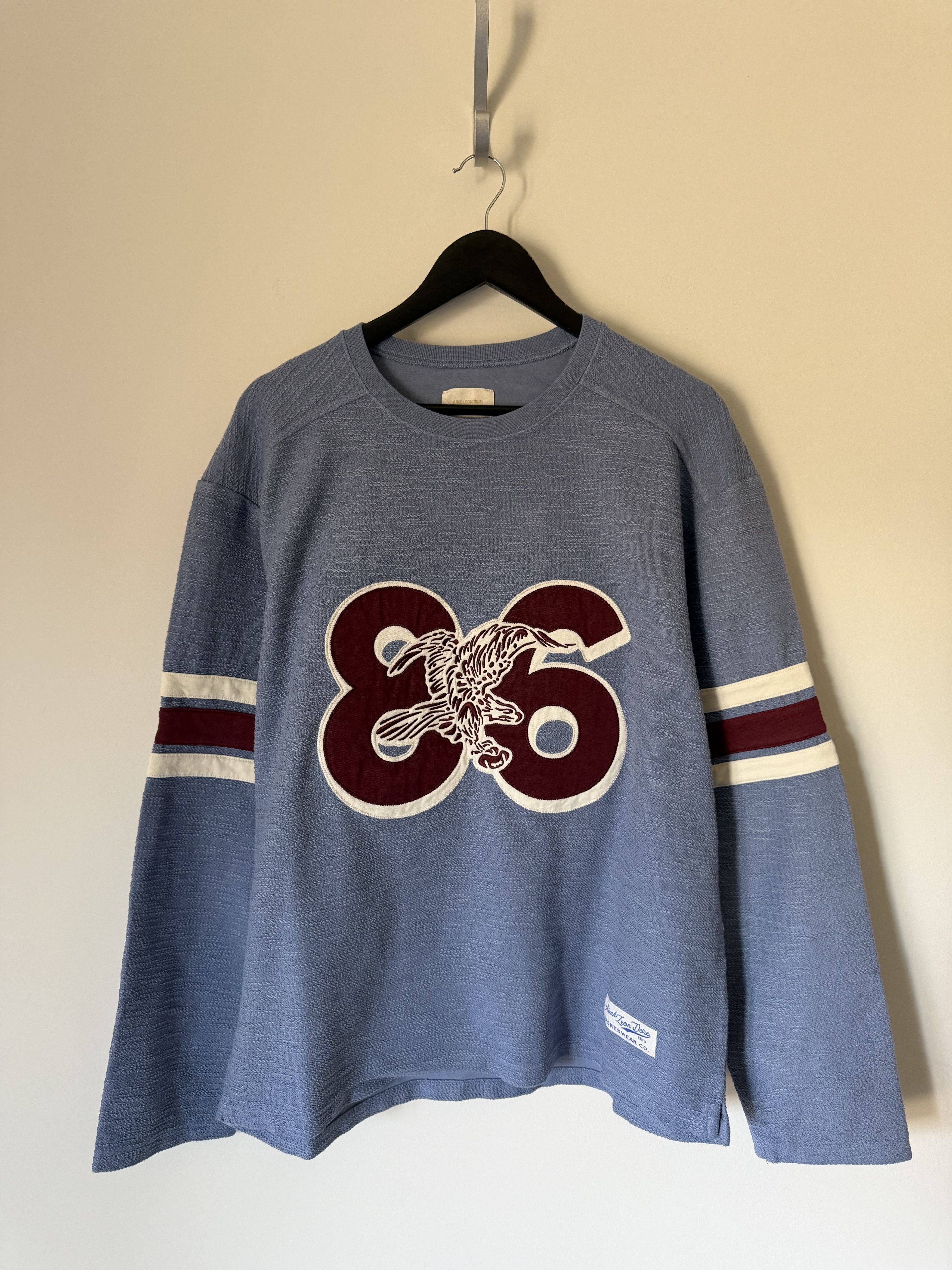Leon Dore Aime Leon Dore Legacy Slub Football Jersey In Blue T-Shirts, Hoodie, Sweatshirt | PodTeesHub.com