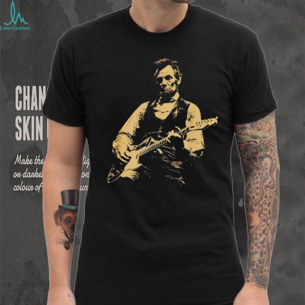 Abraham Lincoln playing electric guitar on a black cotton crew neck unisex shirt