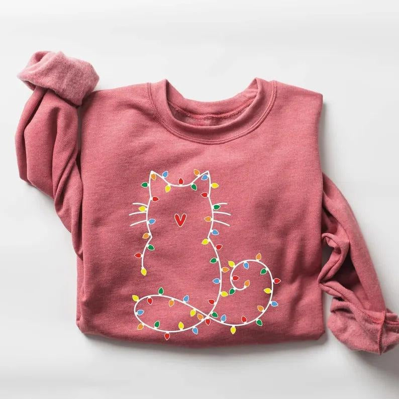 Adorable cat Christmas sweatshirt for women, perfect gift for cat lovers, featuring festive holiday design and cute Xmas...