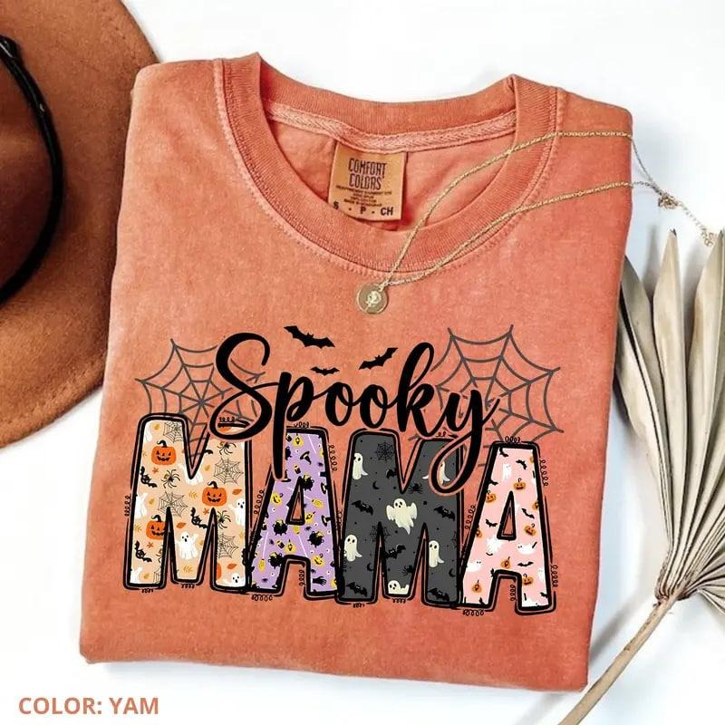 Comfort Colors vintage Halloween mama tee, spooky mom graphic shirt, perfect autumn gift for women, festive Halloween...