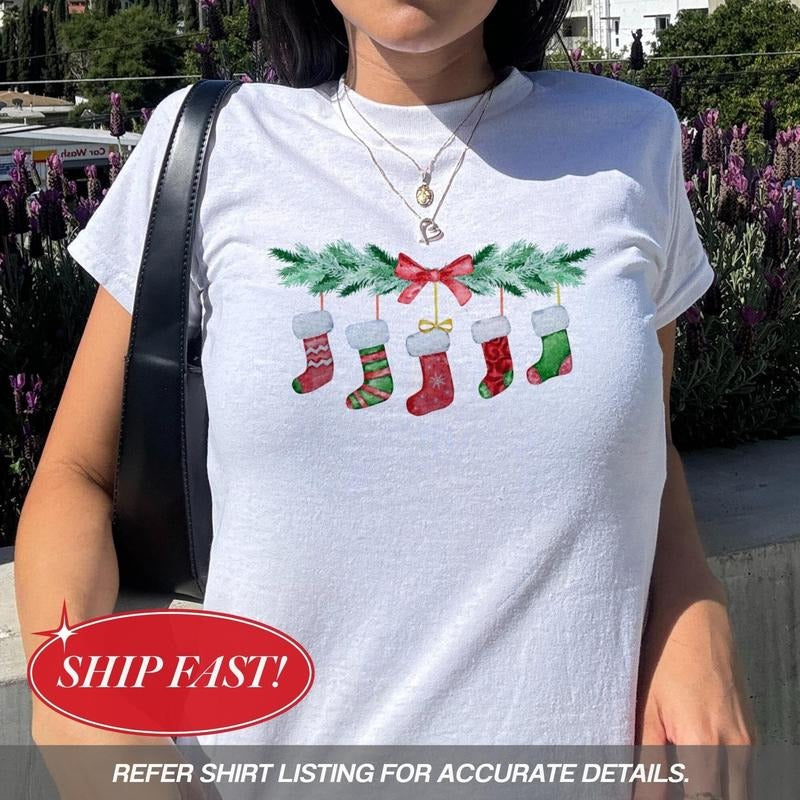 Cute Christmas Baby Tee, Christmas Stocking Shirt, Festive Y2K Aesthetic Tee, Xmas Gift For Her, Retro Christmas Baby...