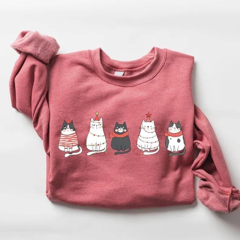 Cute cat Christmas sweatshirt, cozy winter holiday top for women, perfect cat lover or cat mom gift, festive Xmas...