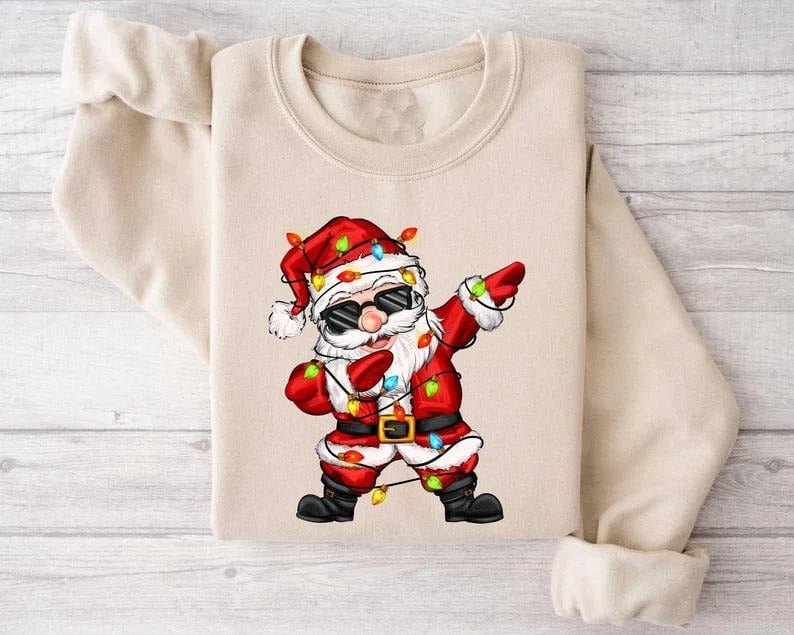 Dabbing Santa Claus Sweatshirt, Christmas Gift, Funny Christmas Tee, Christmas Santa Shirts, Xmas Tree Lights T-Shirt,...