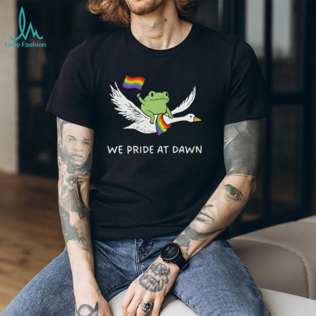 Frog riding goose with rainbow flags featuring we Pride at dawn LGBT shirt