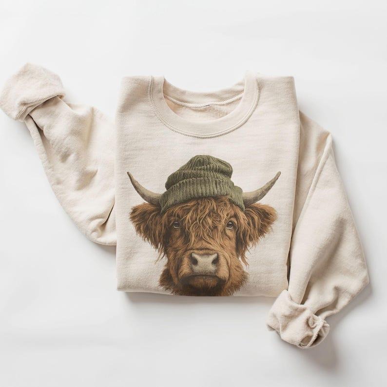Highland Cow Wearing Beanie Unisex Sweatshirt #DICH T-Shirts, Hoodie | PodTeesHub.com