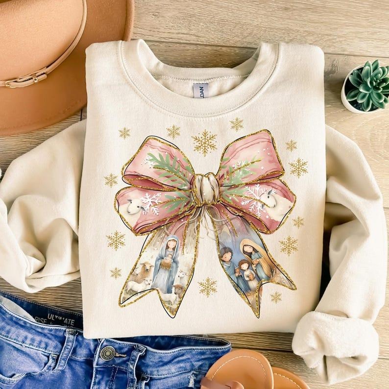 Jesus Christmas Coquette Bow Sweatshirt, Christian Christmas Nativity Scene Shirt Hoodie | PodTeesHub.com