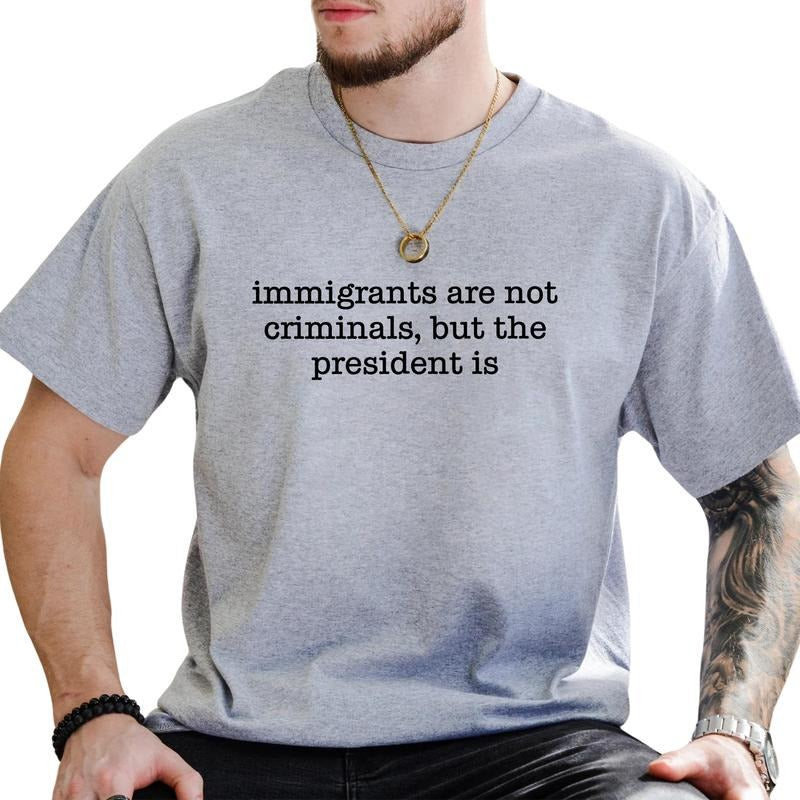 MAPTEES Immigrants Are Not Criminals Graphic Tee, No One Is Illegal T-shirt For Men, Anti MAGA Shirt, 8647 Men Tee,...