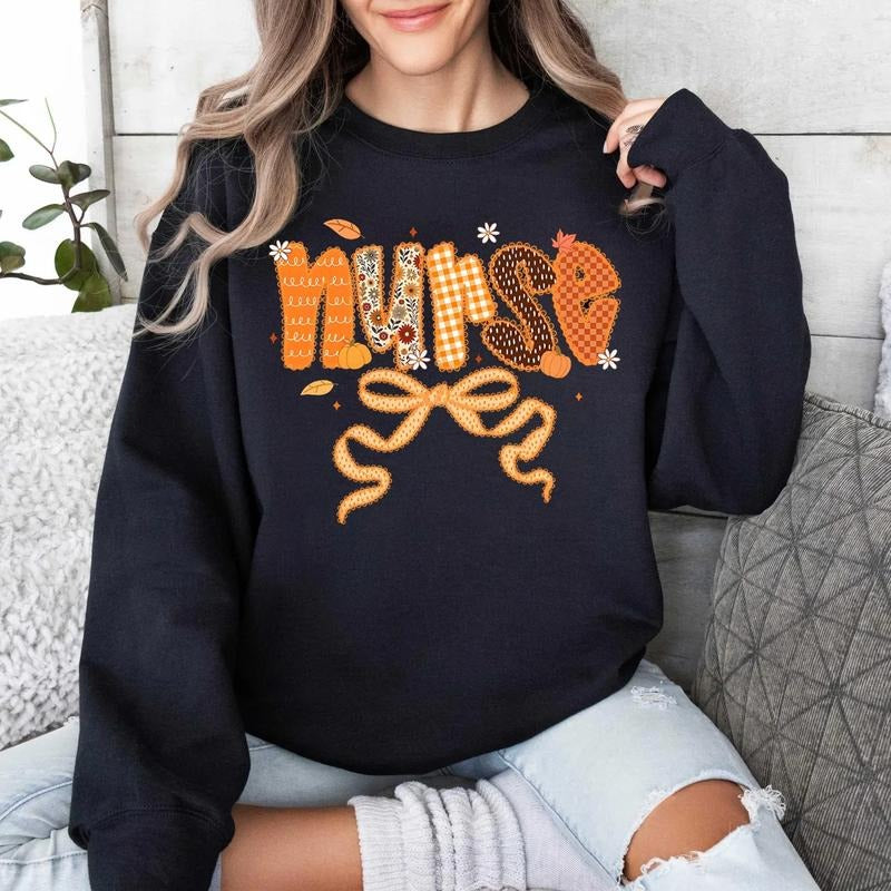 Nurse Fall Sweatshirt, Cozy Autumn Nurse T-Shirt, Pumpkin Bow Graphic Top, Cute Fall Vibes Shirt, Autumn Crewneck for...