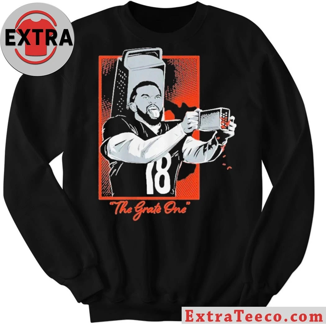 Official T-shirt featuring a caricature of a football player with a grater on his head and a The Grate One caption