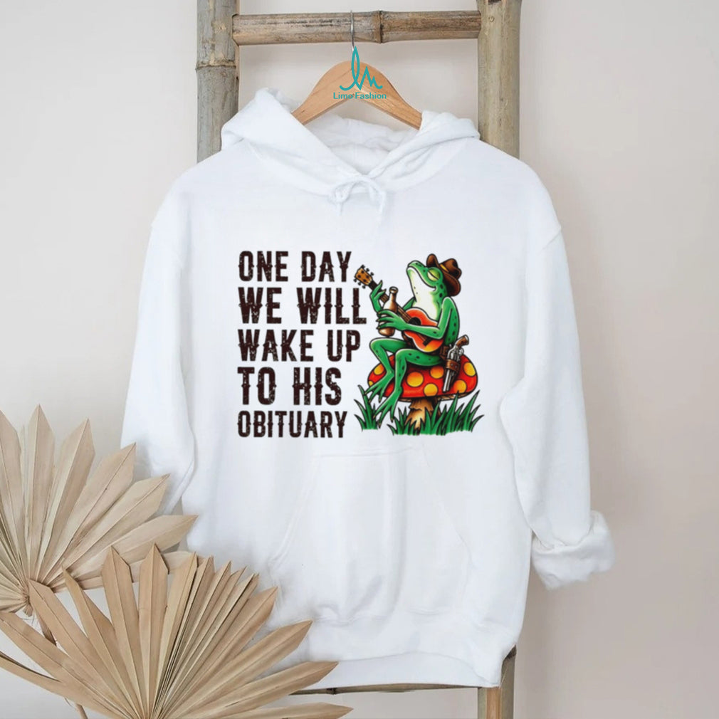 One day we will wake up to his obituary cartoon frog shirt