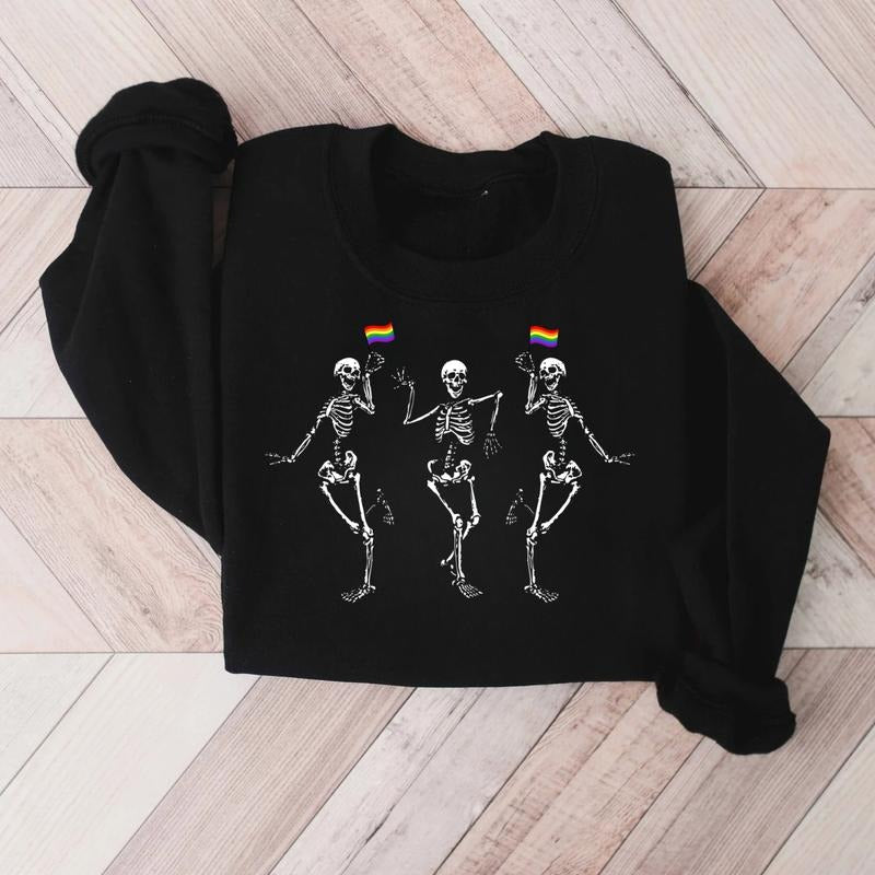 Pride Skeleton Sweatshirt - Dancing Skeletons with Rainbow Flags for LGBTQ Supporters - Fun Halloween or Pride Outfit -...