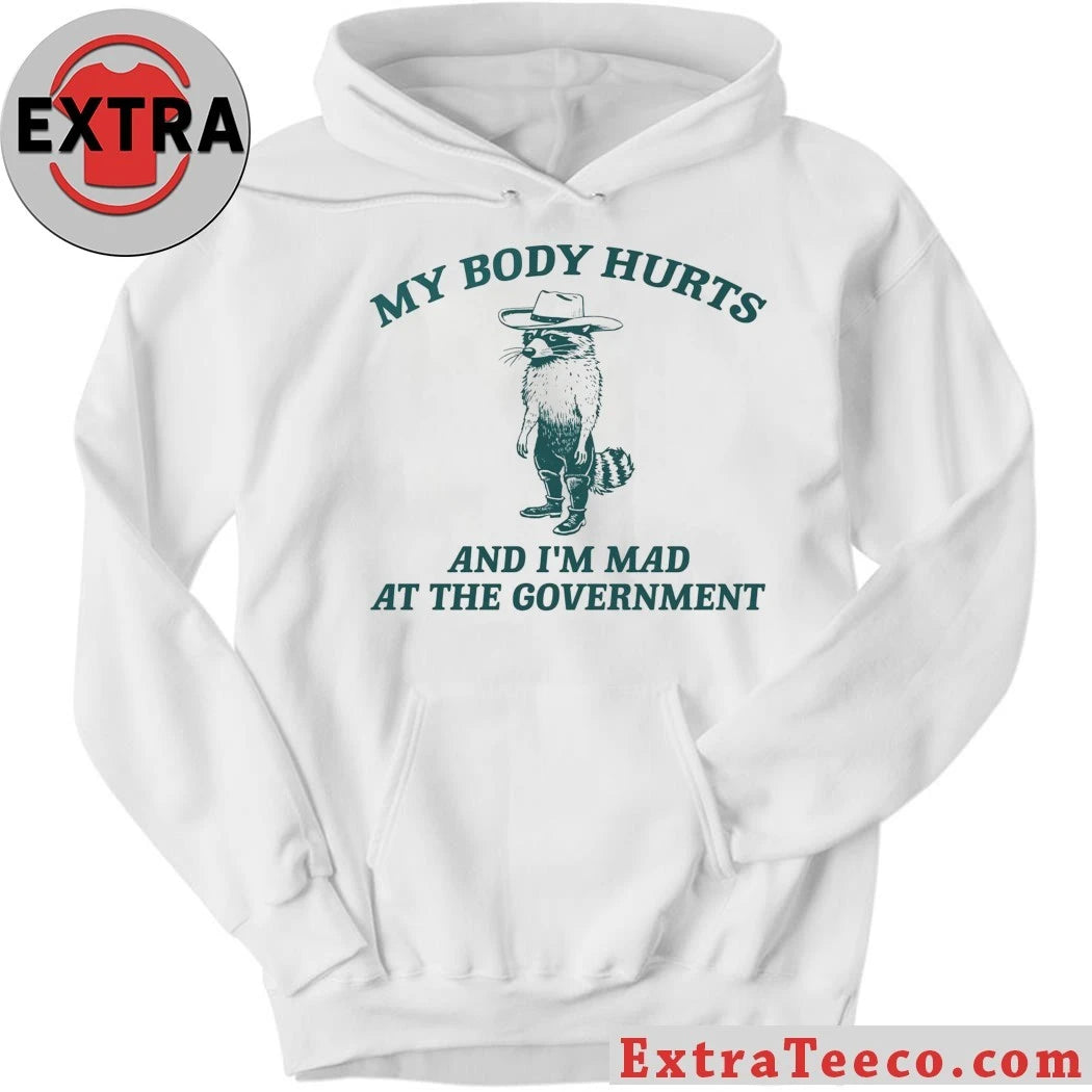 Racoon Wearing Cowboy Hat and Boots My Body Hurts And I’m Mad At The Government 2026 T-Shirt