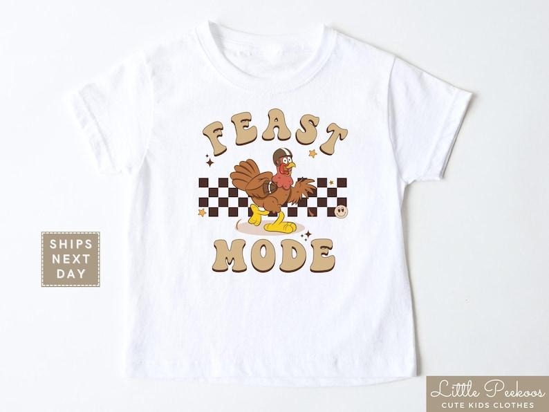 Retro Feast Mode Shirt, Cute Football Turkey Tee, Funny Football Thanksgiving T-shirt, Hoodie and Sweater; T-shirt Cotton...
