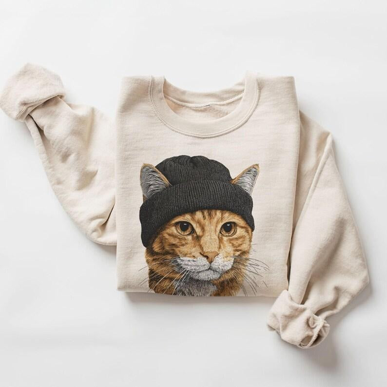 Retro Orange Tabby Cat Wearing Beanie Vintage Unisex Sweatshirt T-Shirts, Hoodie | PodTeesHub.com