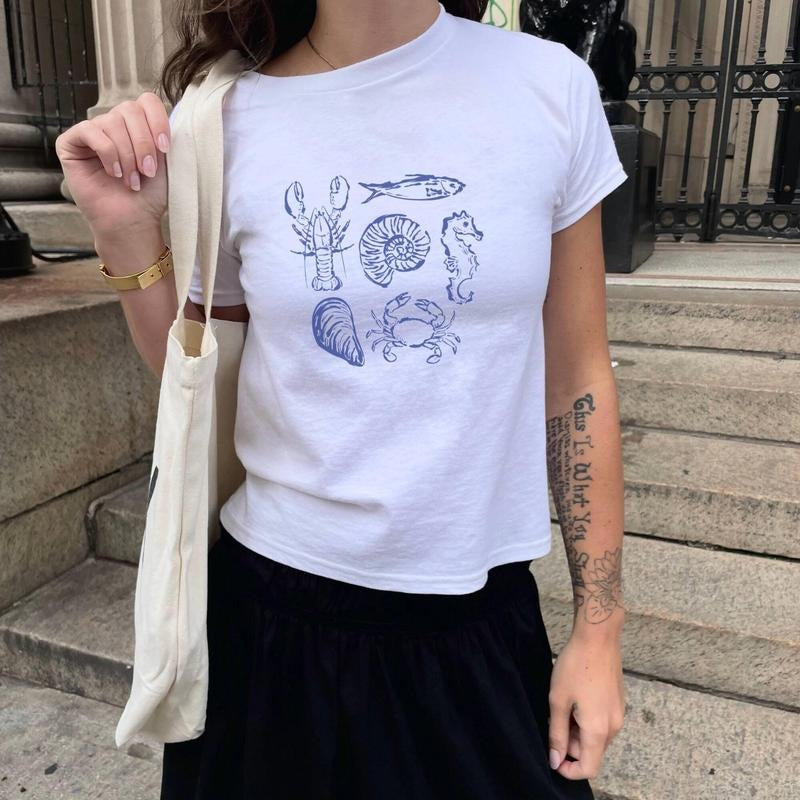 [Sale Up To 40%] Beach Illustration Baby Tee, Cute Ocean Sea Shell, Trendy Shirt For Women, Gifts For Her Hoodie, Sweatshirt