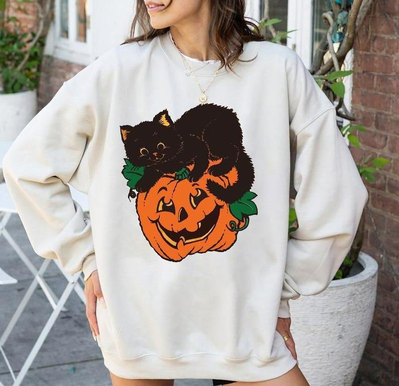 Vintage Black Cat On Pumpkin Sweatshirt, Retro 90s Halloween Shirt, Black Cat Sweatshirt Hoodie | PodTeesHub.com