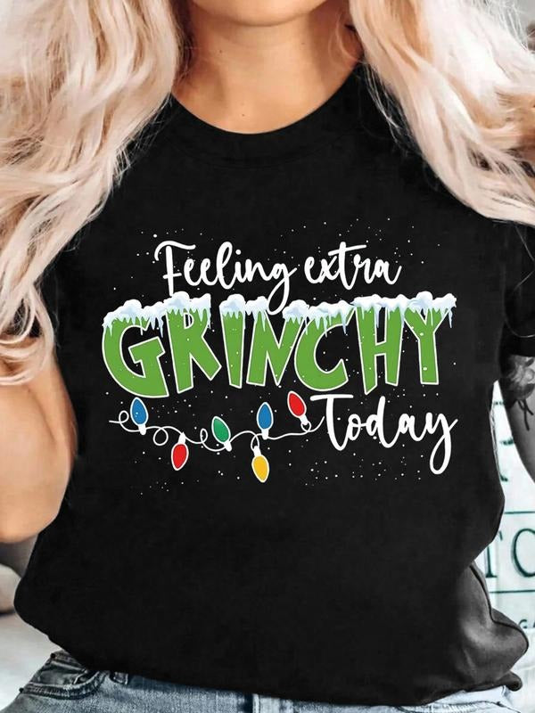 Women's Black Christmas T-Shirt with "Feeling Extra Grinchy Today" Print, Green Snowy Text and Colorful Lights Design,...