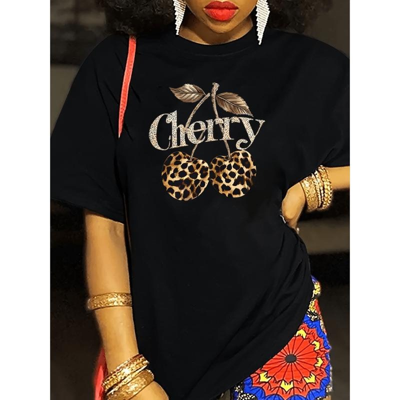 Women's Leopard Print Cherry Graphic T-Shirt With Glitter Lettering Vibrant Orange Round Neck Short Sleeve Top Medium...